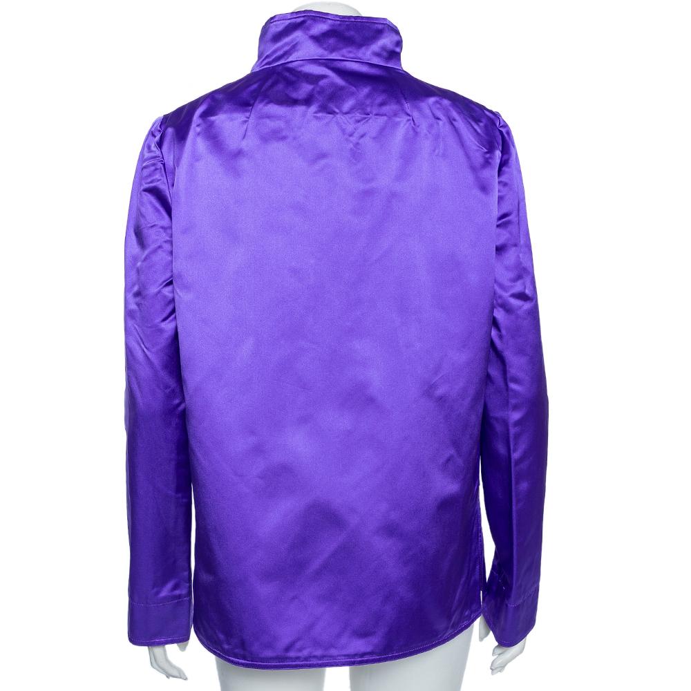 Add a bit of color to your everyday outfit by donning this splendid creation from Dolce & Gabbana. This jacket flaunts a pretty purple shade which makes it appear even more attractive. It is tailored using silk satin and displays a button front