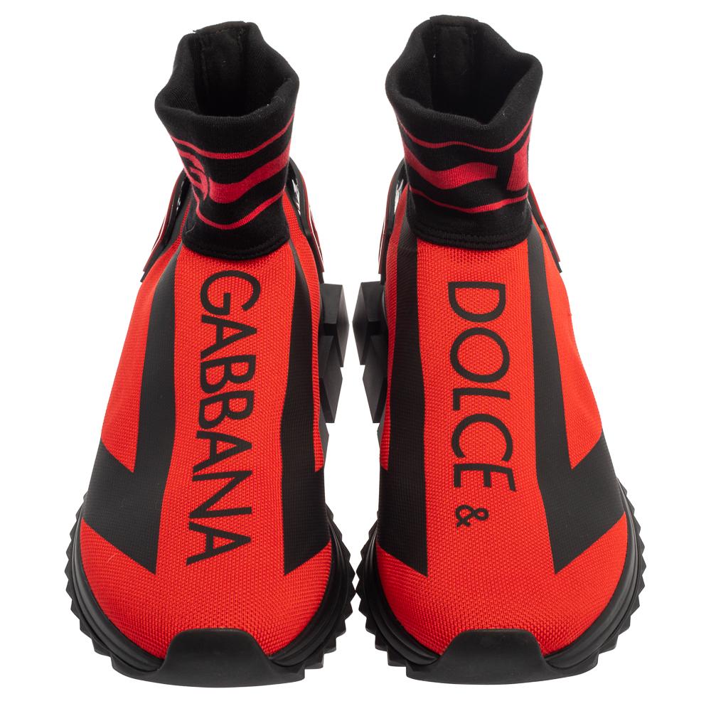 Let your love for high-end fashion come forward by wearing these Sorrento sneakers from Dolce & Gabbana. They are crafted from knit fabric in a sock-like silhouette and styled with round toes. They feature the brand logo detailed on the vamps and