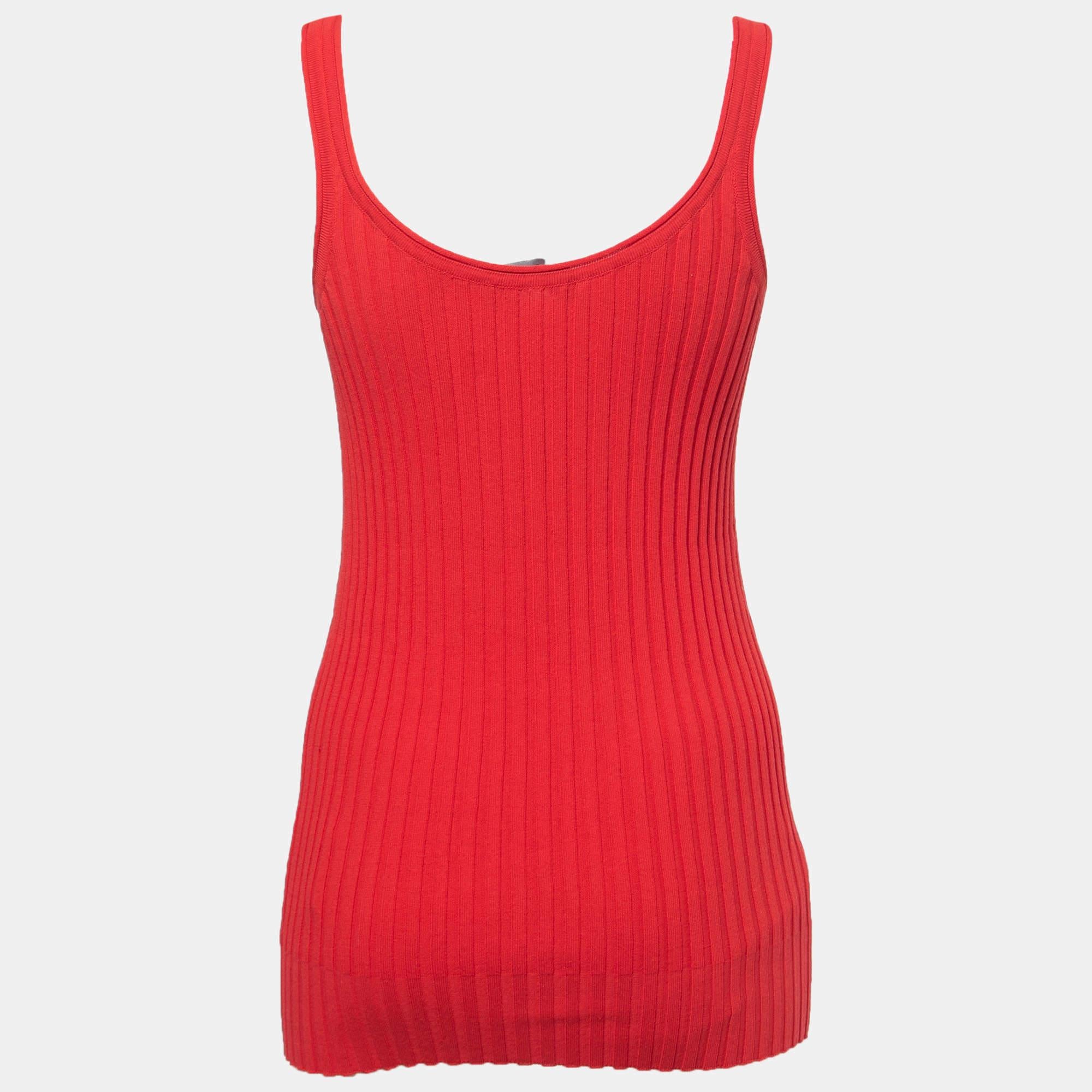 Crafted from high-quality cotton, it features a flattering ribbed knit texture and a vibrant red hue. The tank top offers a slim fit, making it perfect for layering or wearing on its own, adding a touch of Italian luxury to any outfit.

