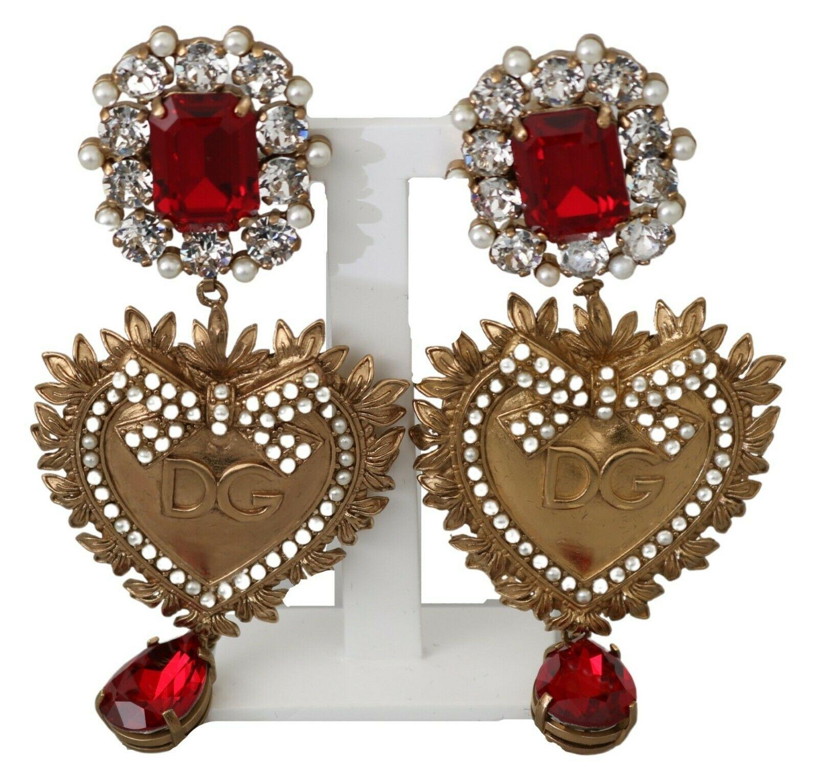  Gorgeous brand new with tags, 100% Authentic Dolce & Gabbana earrings.




Model: Clip-on, dangling
Motive: Heart
Material: 70% Brass, 30% Crystal

Color: Red, gold
Logo details
Made in Italy

Length: 10cm




Dolce & Gabbana box, original tags