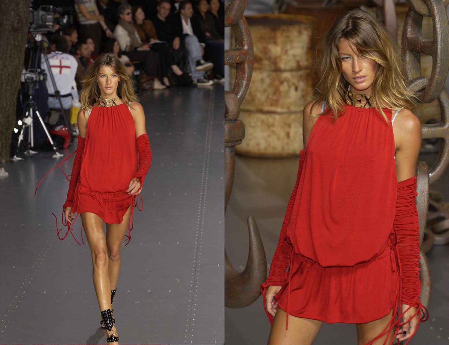 Dolce & Gabbana red viscose jersey mini dress and detached sleeves with various drawstring fastenings.

Spring-Summer 2003