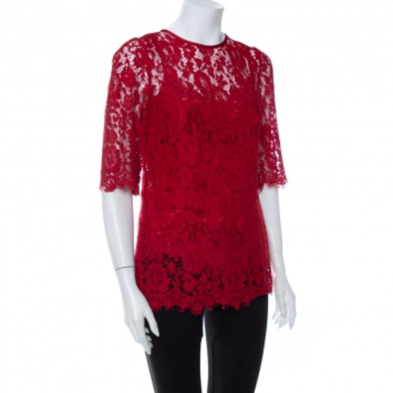 This one is an awesome piece from the house of Dolce & Gabbana. Fabulously crafted, this gorgeous top is crafted from lace fabric in the shade of red. Channel a bold, feminine vibe by styling it with a solid-colored skirt and strappy sandals.
