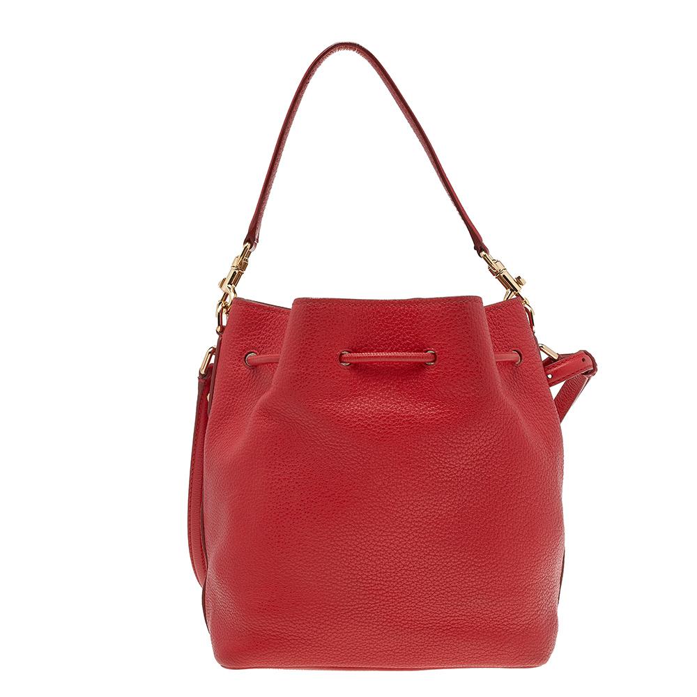 Be a trendsetter with this luxurious bag from Dolce & Gabbana. Crafted with leather, this chic bag is detailed with a gold-tone padlock on the front. With a drawstring closure, this bag is complete with a spacious fabric-lined interior. It will be a