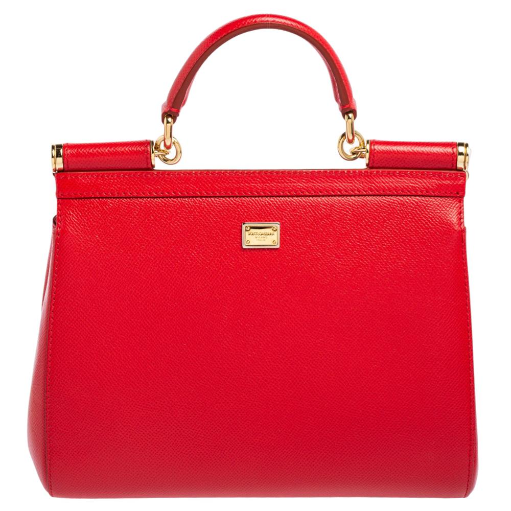 The iconic Miss Sicily bag by Dolce & Gabbana is one of the most loved designs from the brand. The elegant silhouette for this version is made from leather in a red shade and added with eye-catching prints. The creation is complemented with