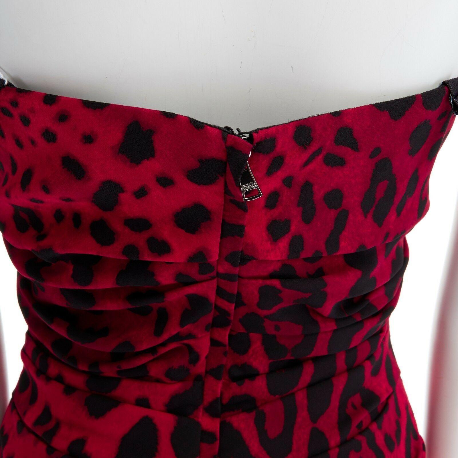 DOLCE GABBANA red leopard print silk ruched draped party dress IT40 S
DOLCE & GABBANA
Silk, elastane. Red and black leopard print. 
Ruched along side seam. Black adjustable silk spaghetti strap. 
Concealed zip back closure. Silver-tone zip pull