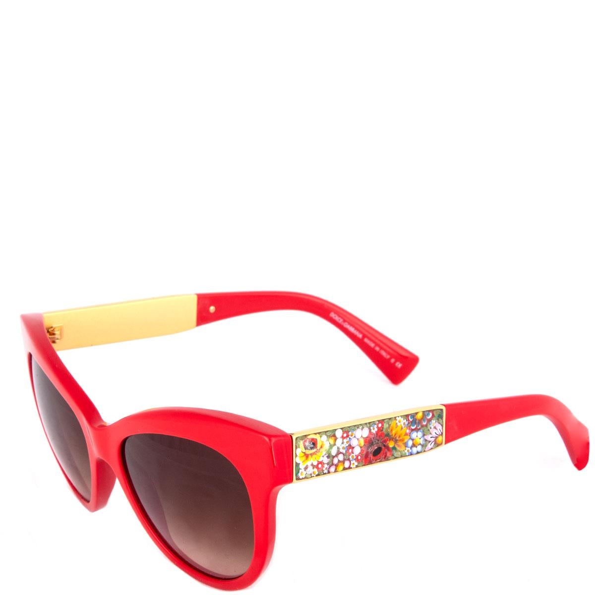100% authentic Dolce & Gabbana 'DG 4215' cat-eye sunglasses in red acetate. Preciously decorated with a hand made floral micro-mosaic in Murano glass on temples fitted with brown gradient lenses. Have been worn and are in excellent condition. Come