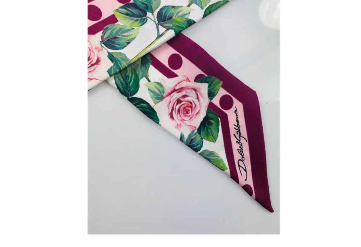 Dolce & Gabbana Pink Tropical Rose printed DG scarf headscarf 
Size 5cmx100cm
100% silk 
Made in Italy 

Brand new with the original tags! 
Please check my other DG clothing & bags & accessories in this print! 
