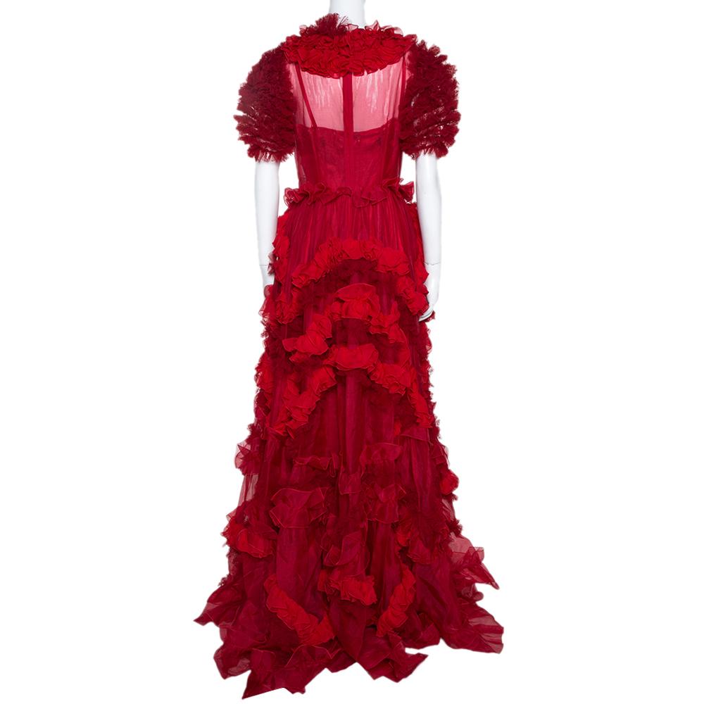 To help you impart the most mesmerizing visions is this dress from Dolce & Gabbana. It is a marvellous design, achieved by a throng of ruffles on soft fabrics and then sewing it into a dreamy silhouette. The lively hemline falls gracefully to the