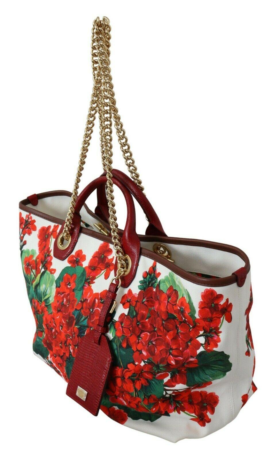 Gorgeous brand new with tags, 100% Authentic Dolce & Gabbana CAPRI cotton tote bag with geranium print features a chain shoulder strap.

Model: CAPRI Tote bag
Material: 90% Cotton 10% Leather
Color: White, gold metal detailing
Handle: Two