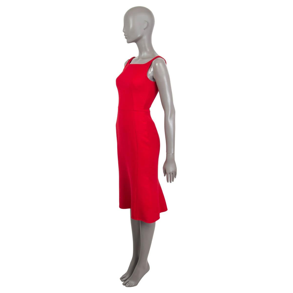 100% authentic Dolce & Gabbana flared knee-length dress in cherry red wool (100%). Opens with a concealed zipper and a hook at the back. Lined in cherry red silk (86%), cotton (8%), elastane (4%) and nylon (2%). Has been worn and is in excellent