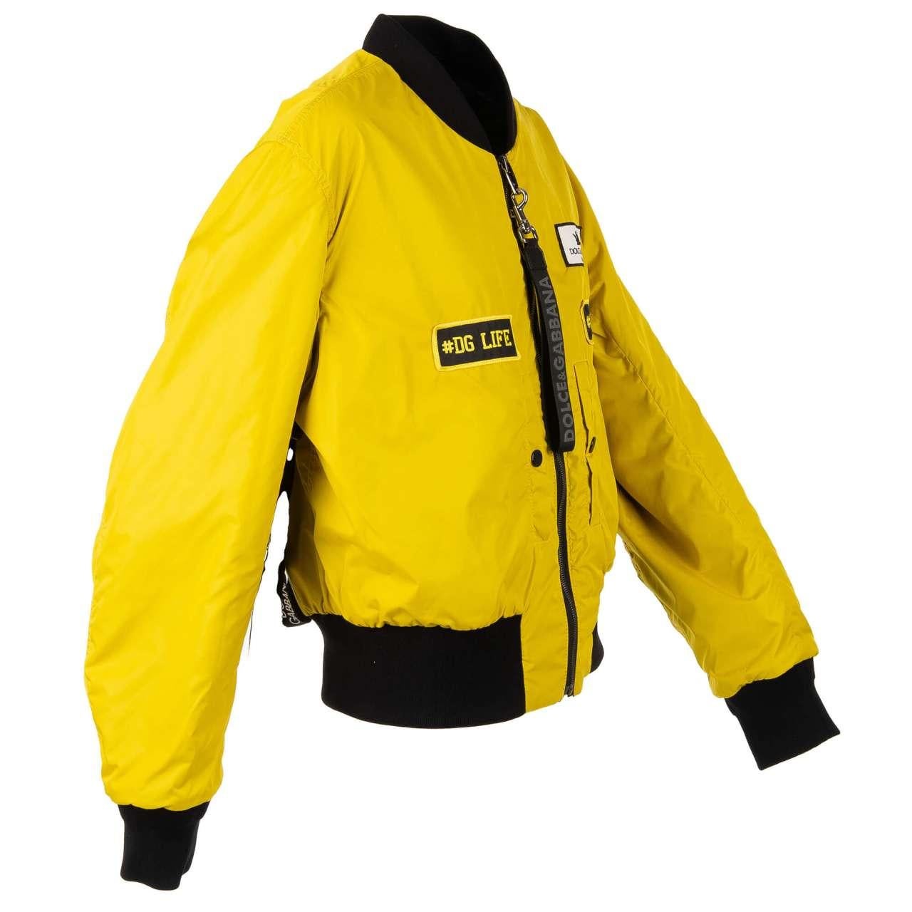 Dolce & Gabbana Wendbare Oversize-Bomberjacke DG Prince in Schwarz und Gelb 52 im Zustand „Hervorragend“ im Angebot in Erkrath, DE