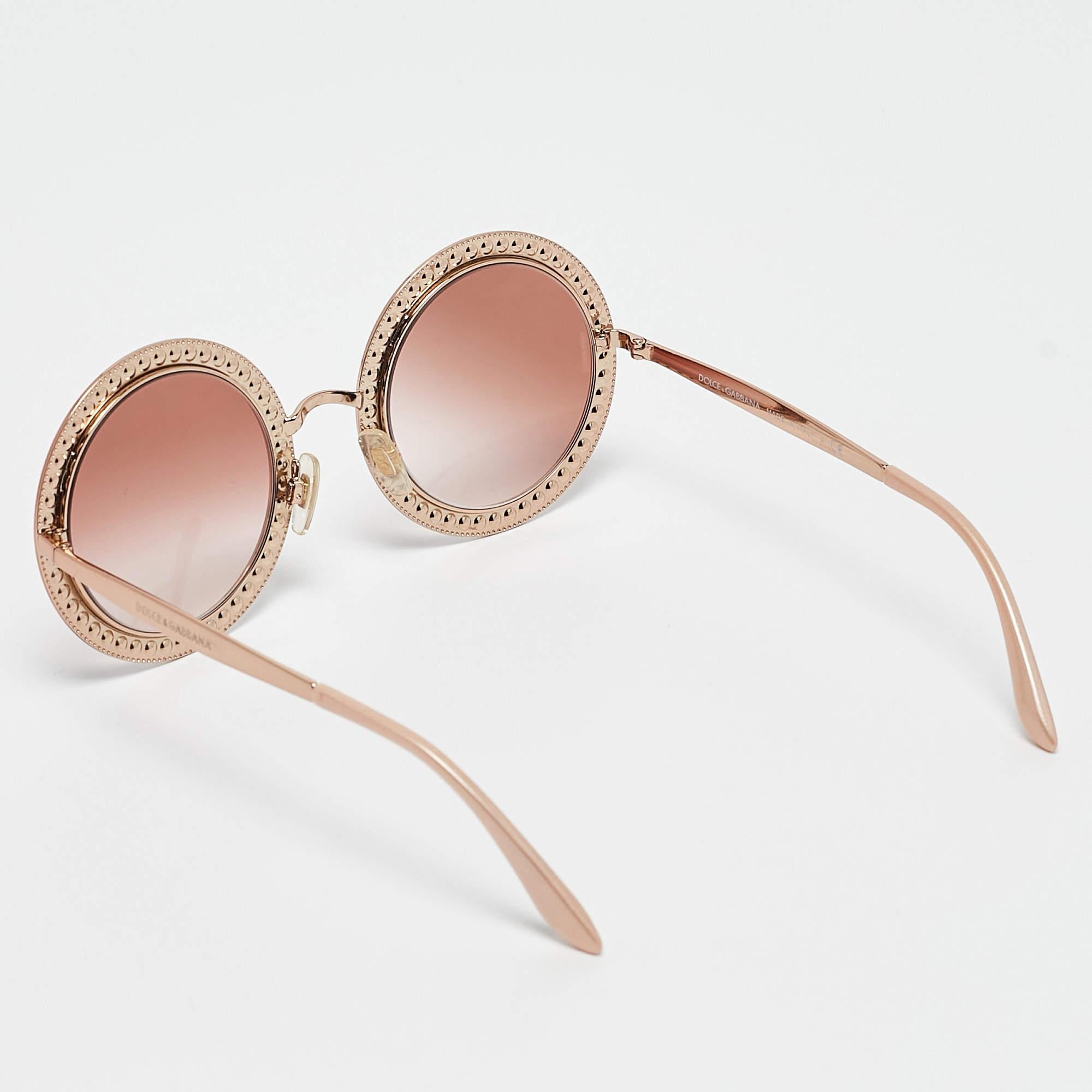 We see the detailing on this exquisite pair of designer sunglasses made from fine materials. The sunglasses are luxe in appeal and practical in usage.