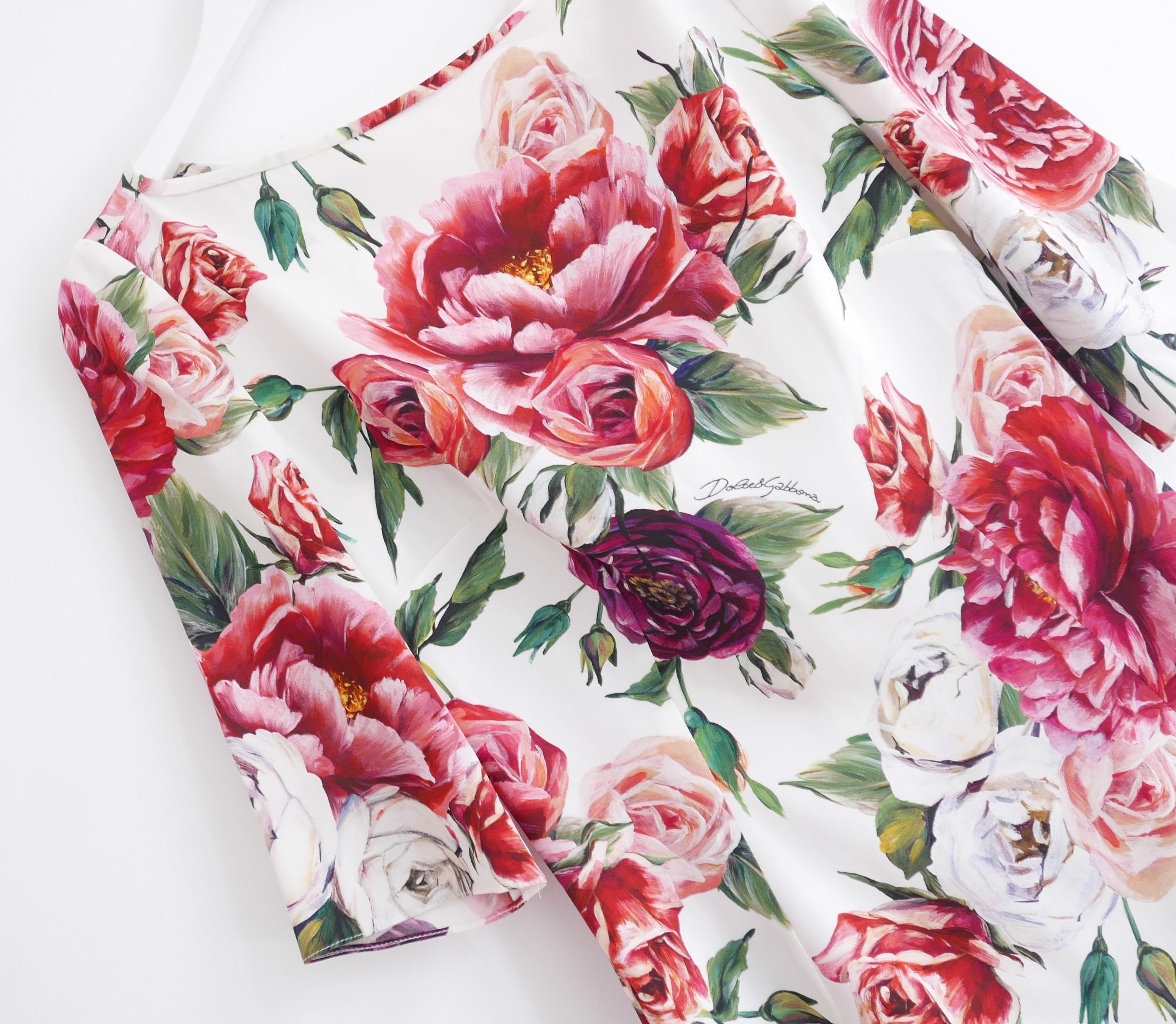 Gorgeous Dolce & Gabbana rose print top. Bought for £950 and new with tags. Made from soft silk and elastane crepe with a gorgeous pink wild rose print. It has a gently tailored cut with boat neckline, elbow length sleeves and concealed zip to back.
