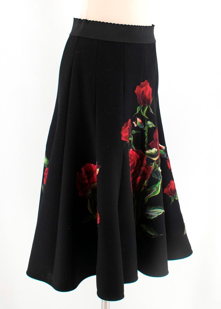 Dolce & Gabbana Black Wool Midi Skirt with Hand Stitched Rose Print. Black Waistband with hidden side zip.

- Pleated Skirt 
- Silk Slip Skirt lining 

-90% Virgin Wool
-10% Viscose 
Lining
- 88% Silk
- 8% Cotton
- 4% Elastane
- 2% Nylon

Care