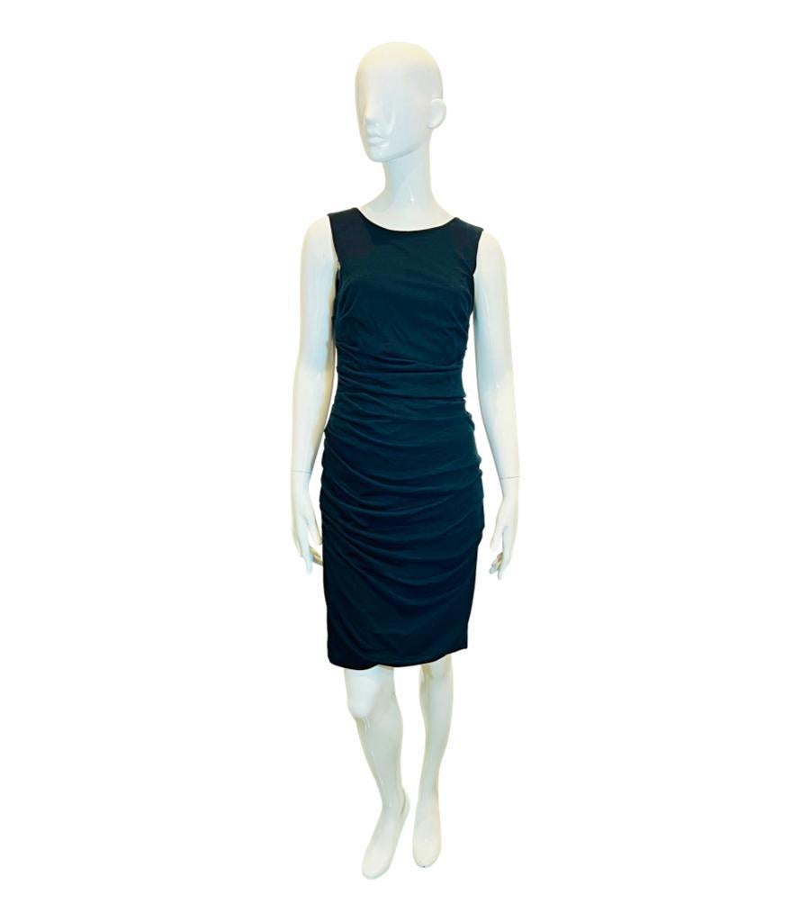Dolce & Gabbana Ruched Wool Dress
Dark green/grey bodycon dress styled with ruched design.
Featuring above-the-knee length, round neckline and concealed zip closure to rear.
Size – 44IT
Condition – Very Good
Composition – 100% Virgin Wool
