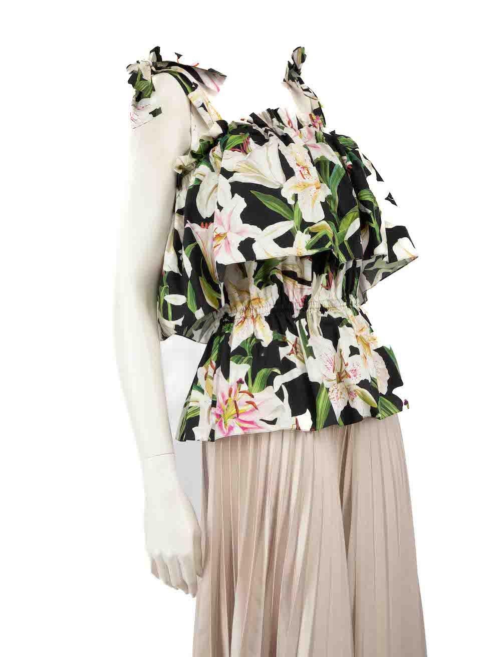 CONDIT ist sehr gut. Kaum sichtbare Abnutzungserscheinungen am Oberteil sind bei diesem gebrauchten Dolce & Gabbana Designer-Wiederverkaufsartikel zu erkennen.
 
 
 
 Einzelheiten
 
 
 Multicolor-Schwarz und Blumendruck
 
 Baumwolle
 
 Top
 
 Lilie