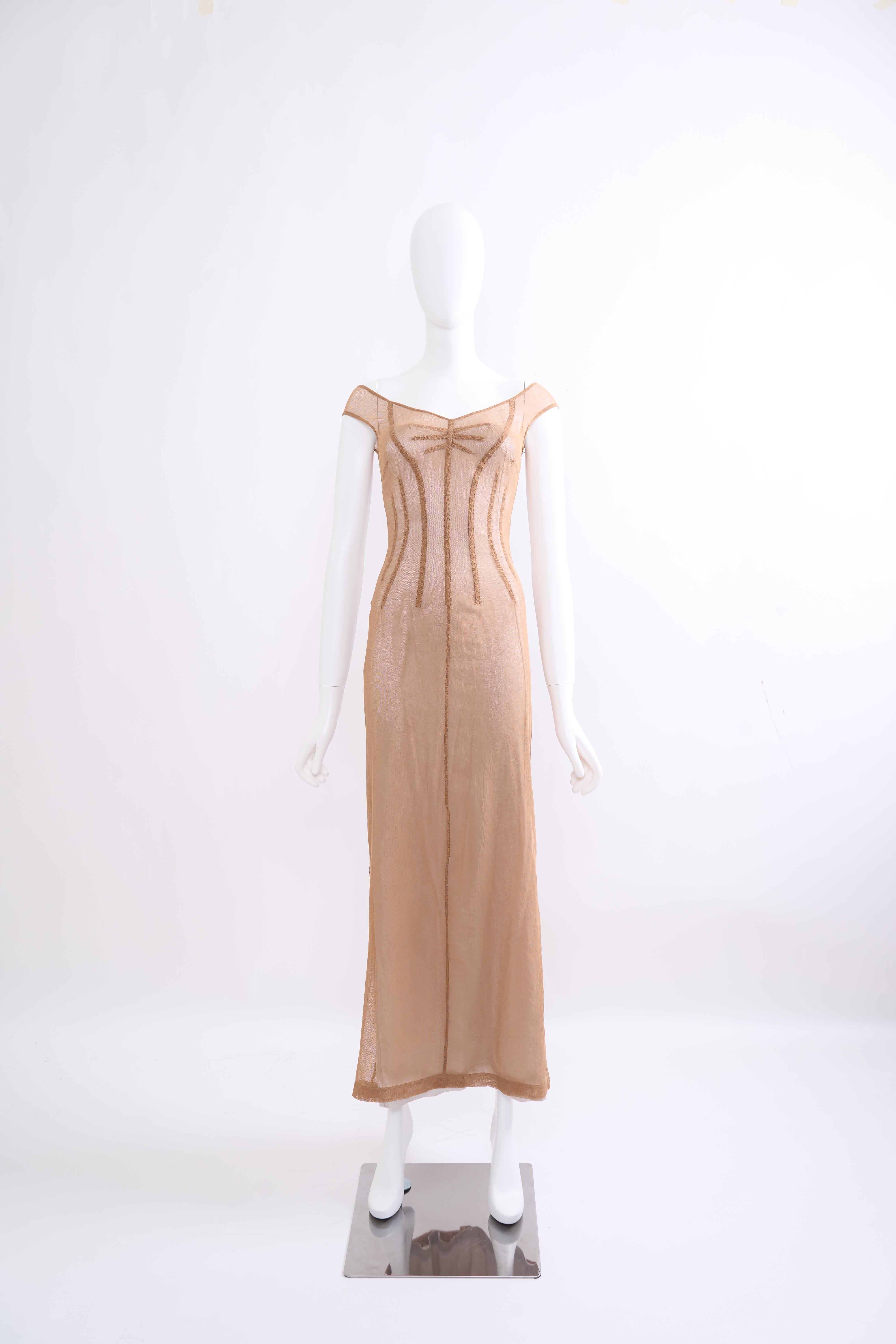 This exquisite Dolce & Gabbana beige dress is a true collector's item, gracing the brand's iconic 1998 spring/summer runway.

Crafted with meticulous attention to detail, the dress features a fitted bodice that flows into a floor-length skirt,