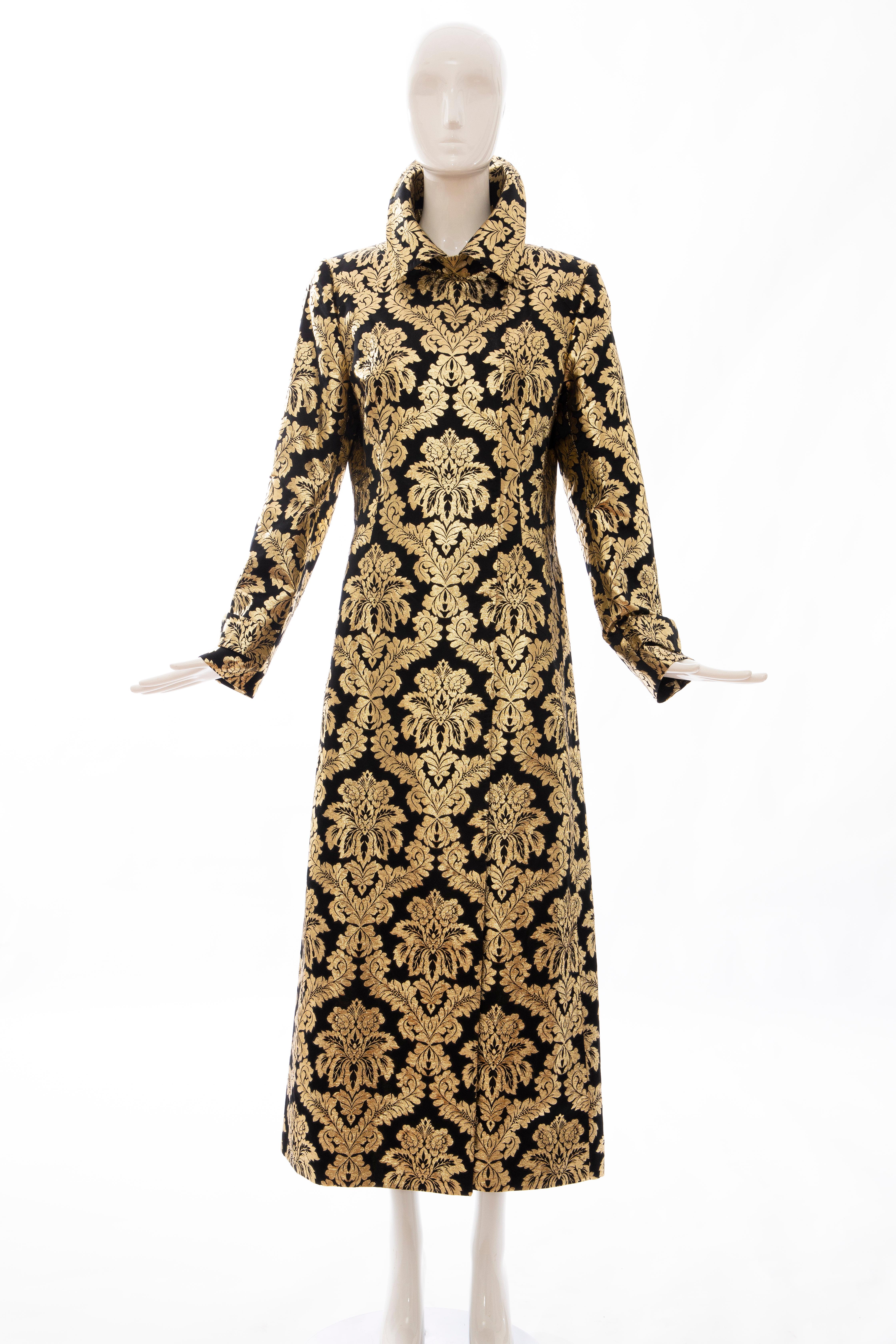 Dolce & Gabbana, Runway Fall 2000, black silk gold floral metallic long brocade evening coat, double front concealed snap fastener closures, back vent and fully lined.

IT.44, US. 8

Bust: 38, Waist: 35, Hip: 42, Shoulder: 15.5, Sleeve: 25.5,