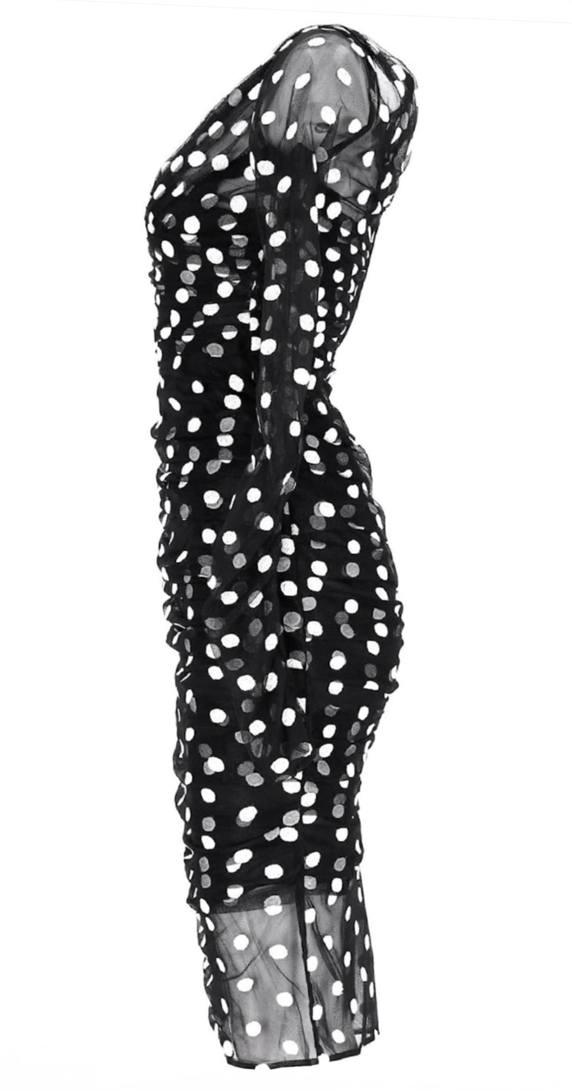 Questo pezzo quintessenziale della sfilata Primavera/Estate 2015 di Dolce & Gabbana incarna il glamour siciliano tipico della maison. Realizzato in tulle nero trasparente ricamato con audaci pois bianchi, è increspato ad arte per delineare la
