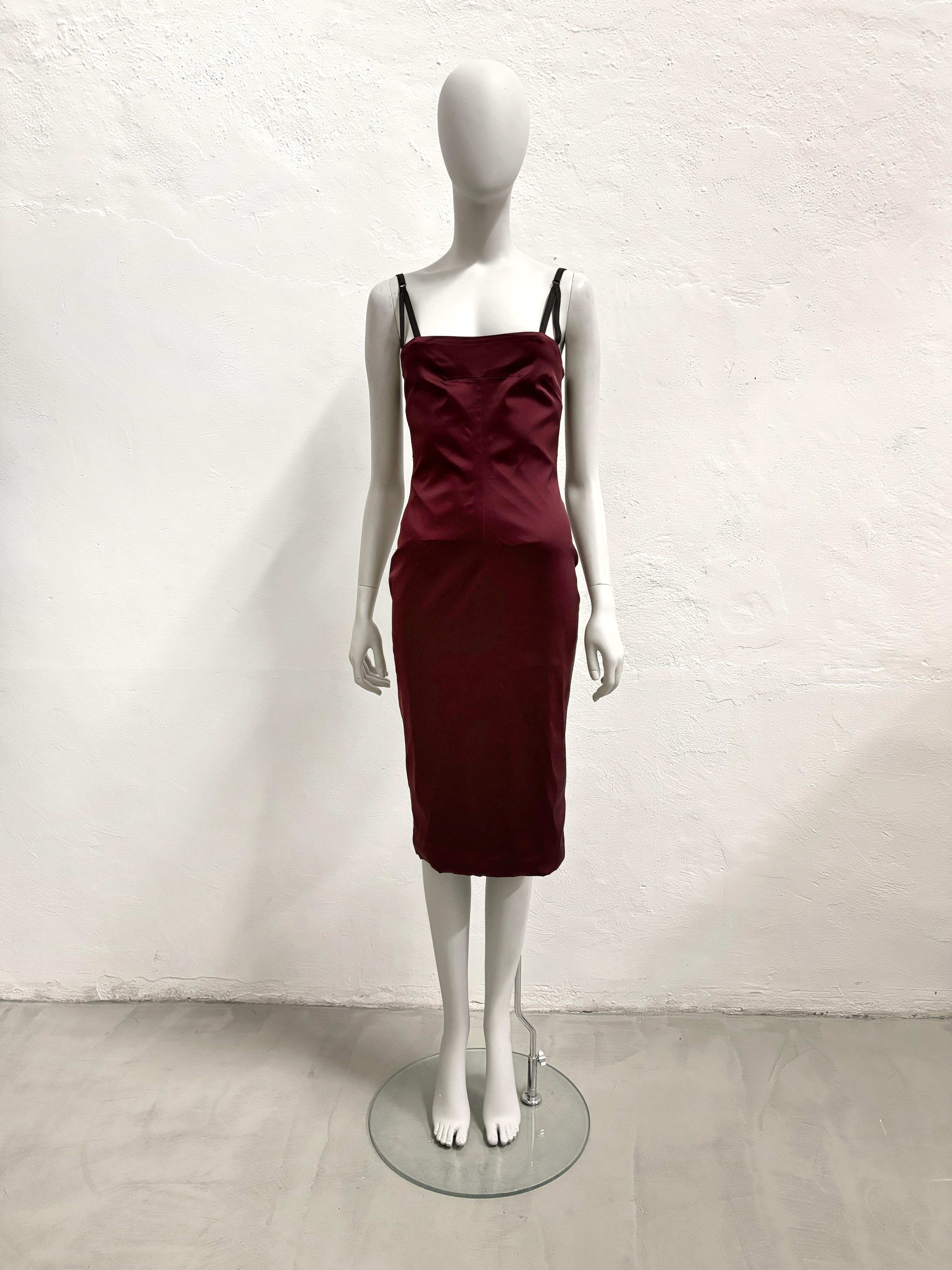- Dolce & Gabbana
- Sold by Gold Palms Vintage
-Spring Summer 1999 collection
-Bodycon dress
-Black straps
-Burgundy colorway
-Hooks closure
-Size IT 42

Measurements (flat):
-Bust: 36 cm/ 14.1 inches 
-Waist: 33 cm/ 12.9 inches
-Hips: 40 cm/ 15.7