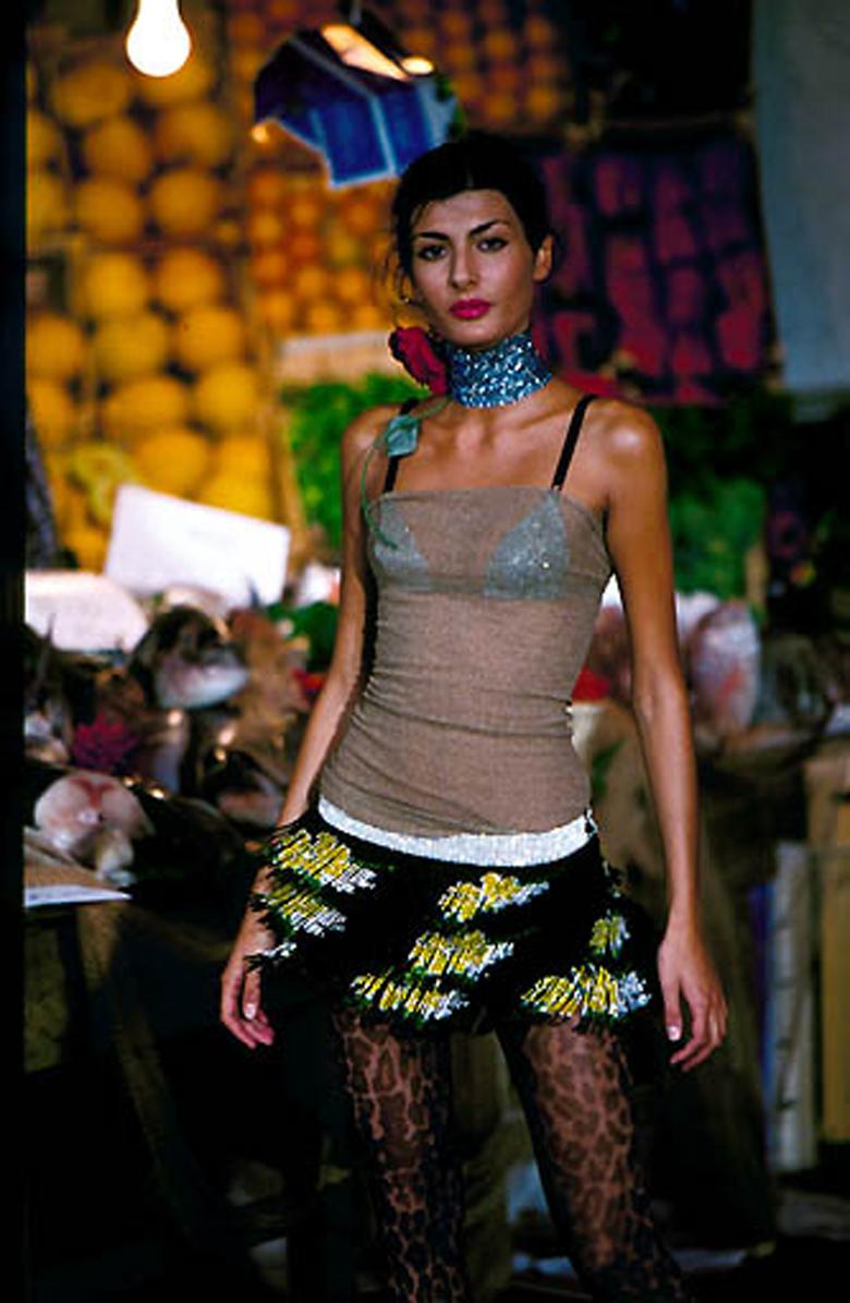 Dolce & Gabbana Spring/Summer 2000 beaded mini skirt, as seen on the runway. An identical skirt was recently worn by Suki Waterhouse at a performance.

Condition
Excellent, with original box

Marked Size
IT 38

Approximate Measurements
Waist: