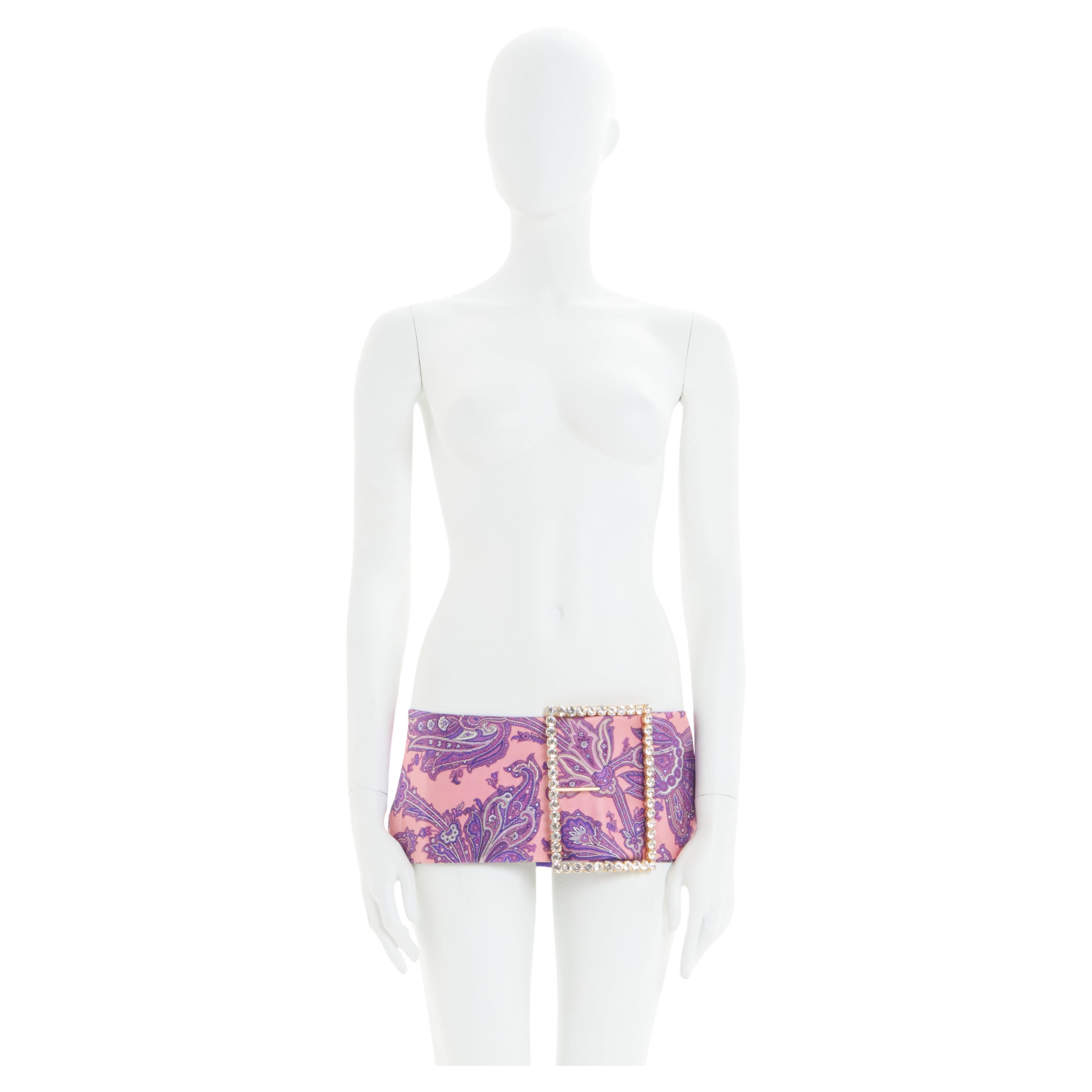 - Archival Dolce & Gabbana Micro Mini Skirt
- Mix & Match Collection
- Sold by Skof.Archive 
- Spring - Summer 2000
- Purple & Pink paisley printed silk 
- Oversized Swarovski crystal belt buckle 
- Silk lining 
- Velcro closure 
- Length: 18 cm /