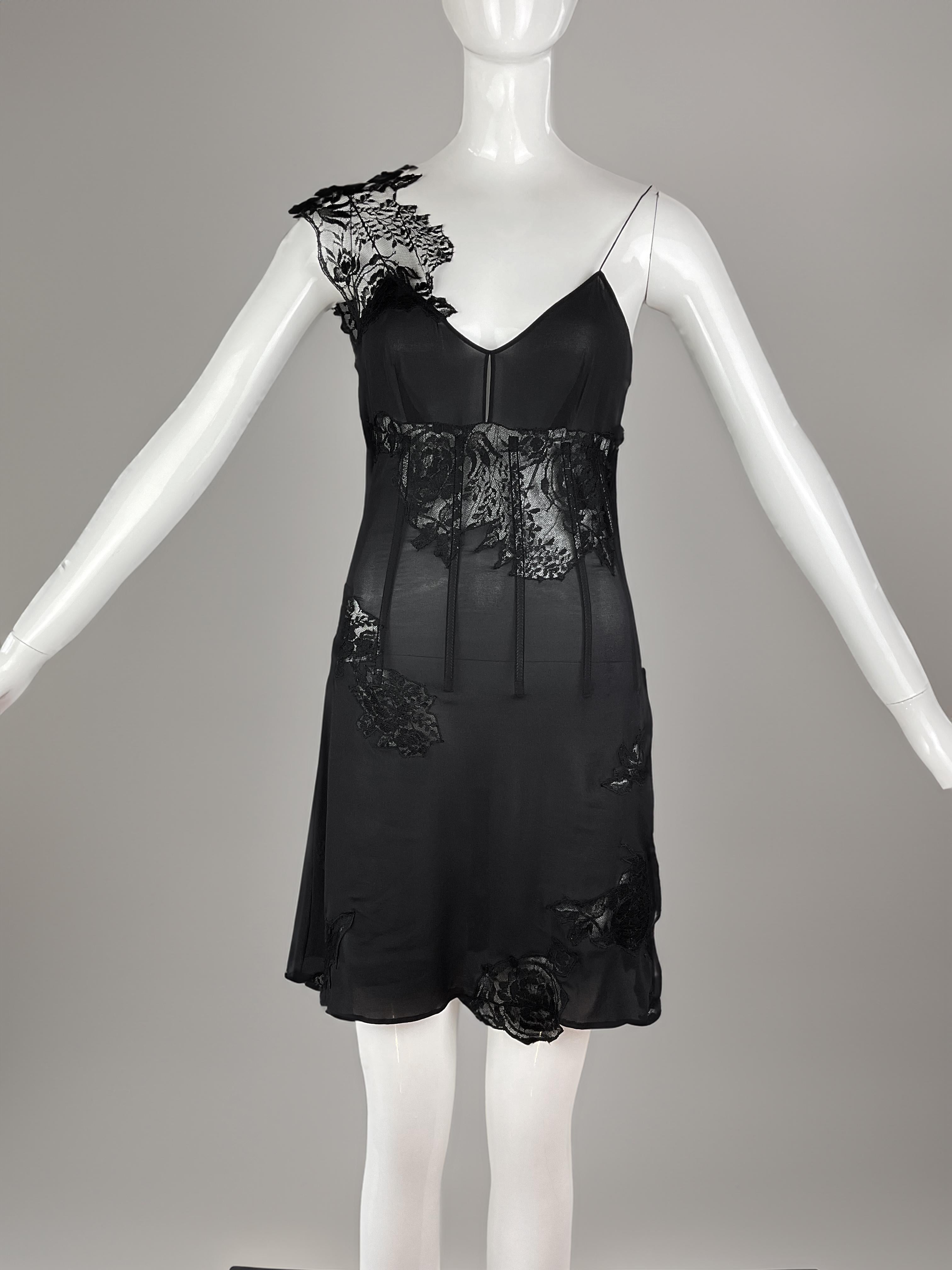 Dolce & Gabbana Spring Summer 2002 Runway Sheer Lace Corset Black Mini Dress 

Size:  Italian 40 / FR 36 / US 4 
Condition: Very Good 

