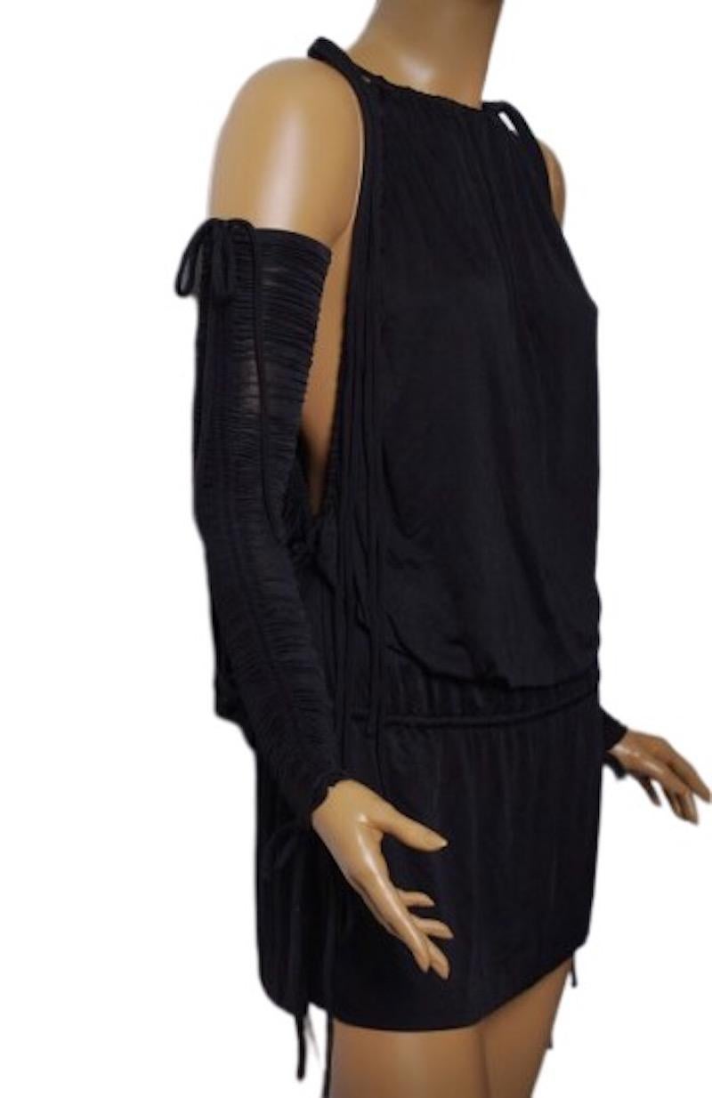 Spring summer 2003 Love & Sex collection Dolce & Gabbana dress

Open shoulders, ties on the sleeves and on the dress

Drape on sleeves

Drop waist

Size: IT 38, US - 2

Excellent condition