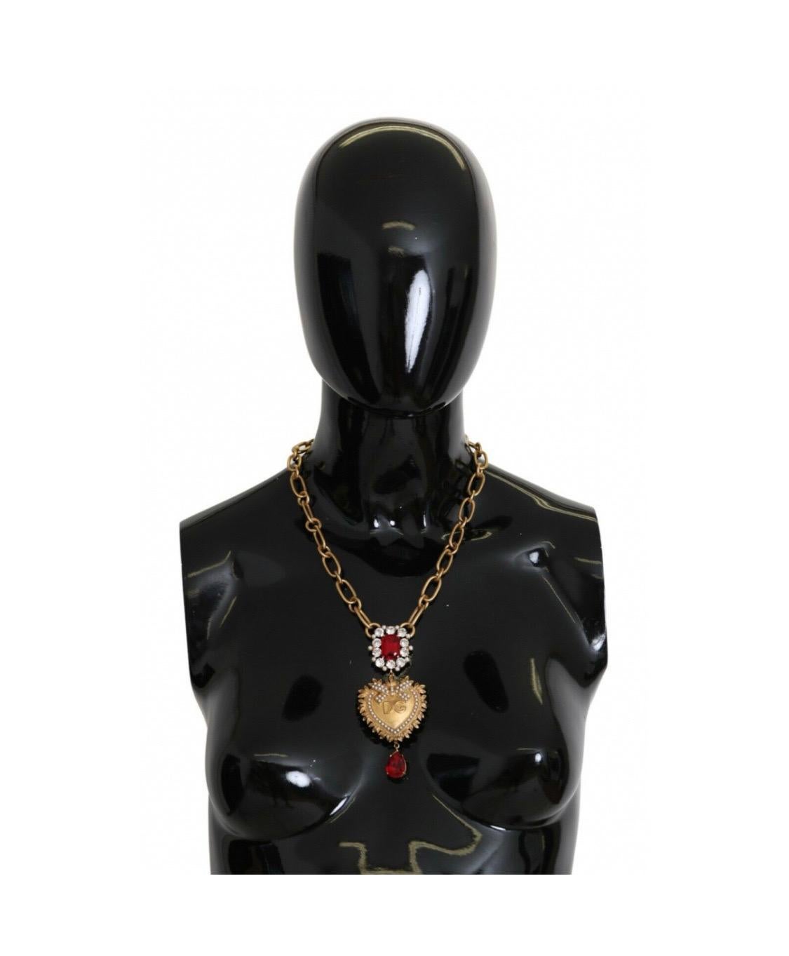 Gorgeous brand new with tags,
100% Authentic Dolce &
Gabbana sacred heart pearl pendant
necklace with red crystals.
Model: Statement necklace
Motive: Sacred heart

Material: Brass, Crystal

Color: Gold

Crystal: Red

Lobster clasp closure

Logo
