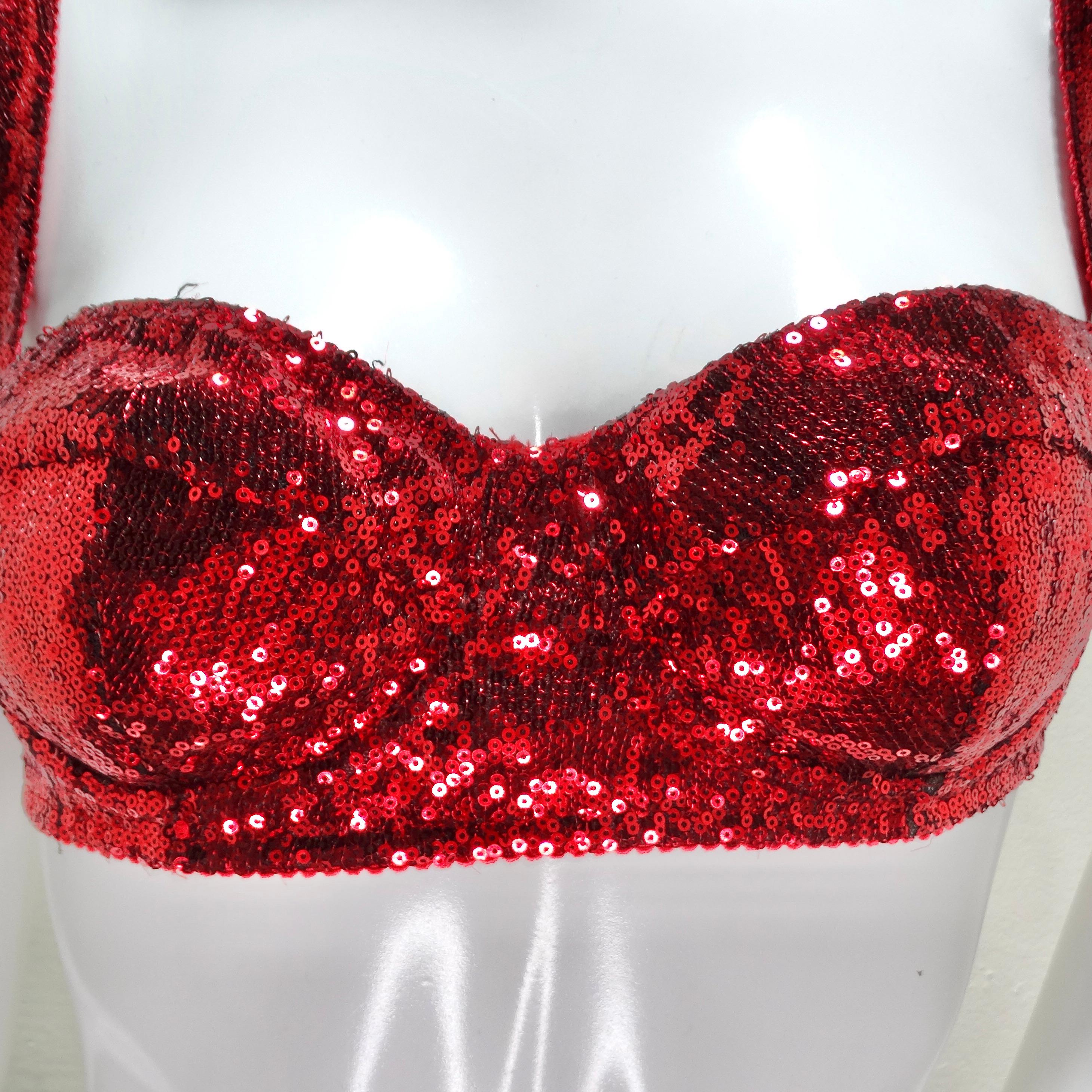 Make a bold statement with the Dolce & Gabbana Sequin Balconette Bra, a classic balconette-style bra that doubles as a glamorous cropped bustier top. This distinctive piece, crafted by Dolce & Gabbana, showcases the brand's iconic silhouette with a