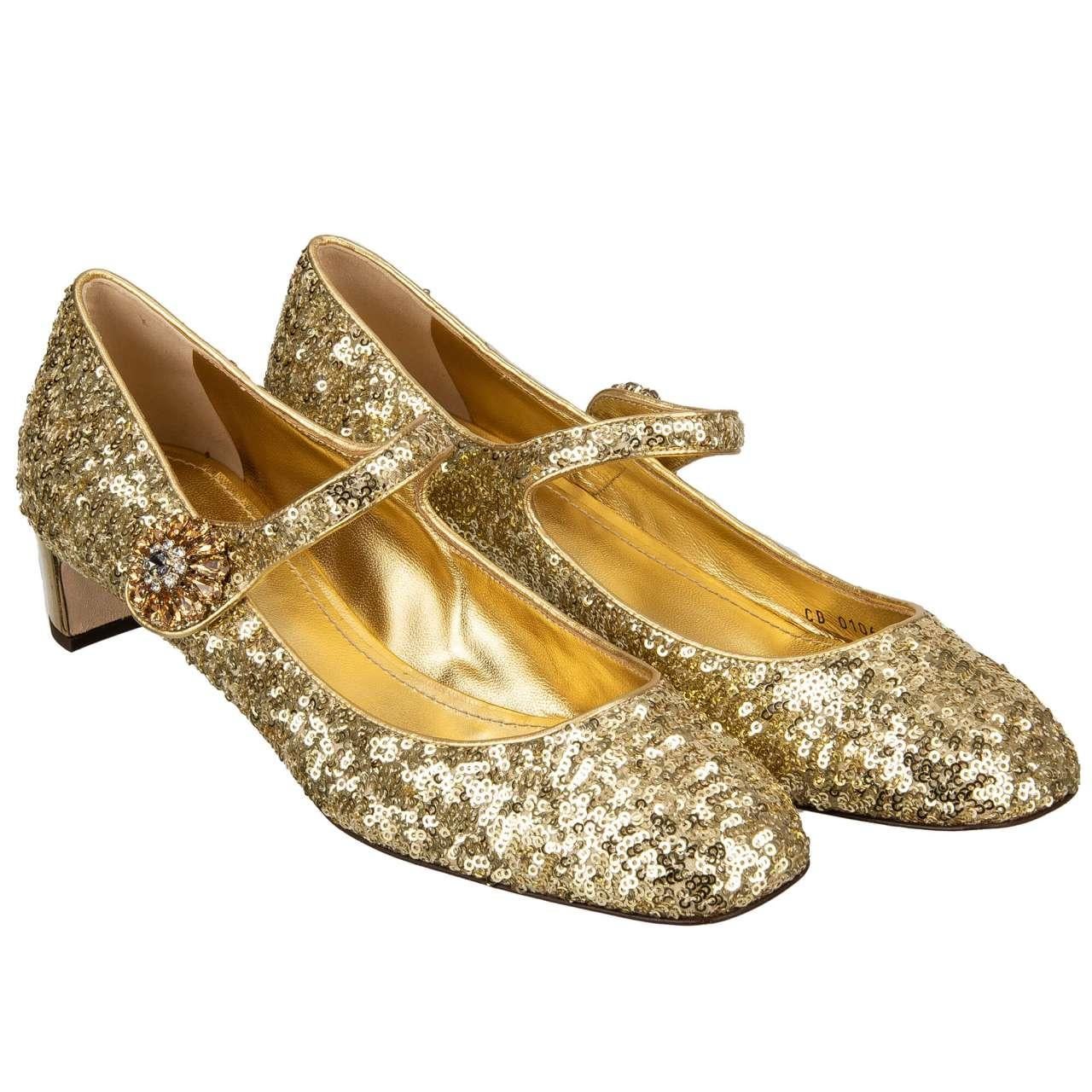 - Sequin Mary Jane Pumps VALLY in gold with crystal heels and crystal strap closure by DOLCE & GABBANA - New with Box - MADE IN ITALY - Decorative crystals - Elastic closure - Model: CD0106-AL346-80997 - Material: 80% Polyester, 20% Lambskin - Inner