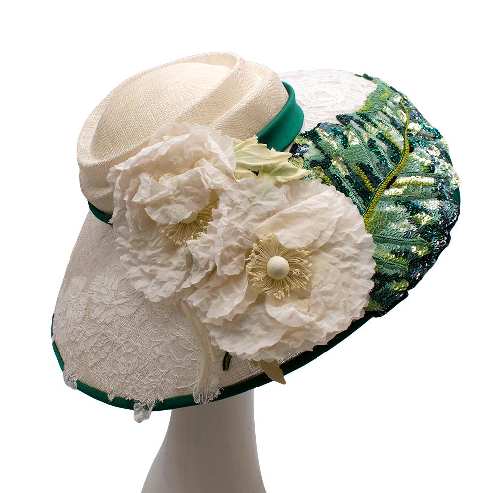 Dolce & Gabbana Sequin & Lace Detailed Floral Embellished Raffia Hat

- Large leaf embellishment on the side of the hat with a mixture of green toned matte and shiny sequins with light green stalk beads
- Raffia structured material in cream
- Large