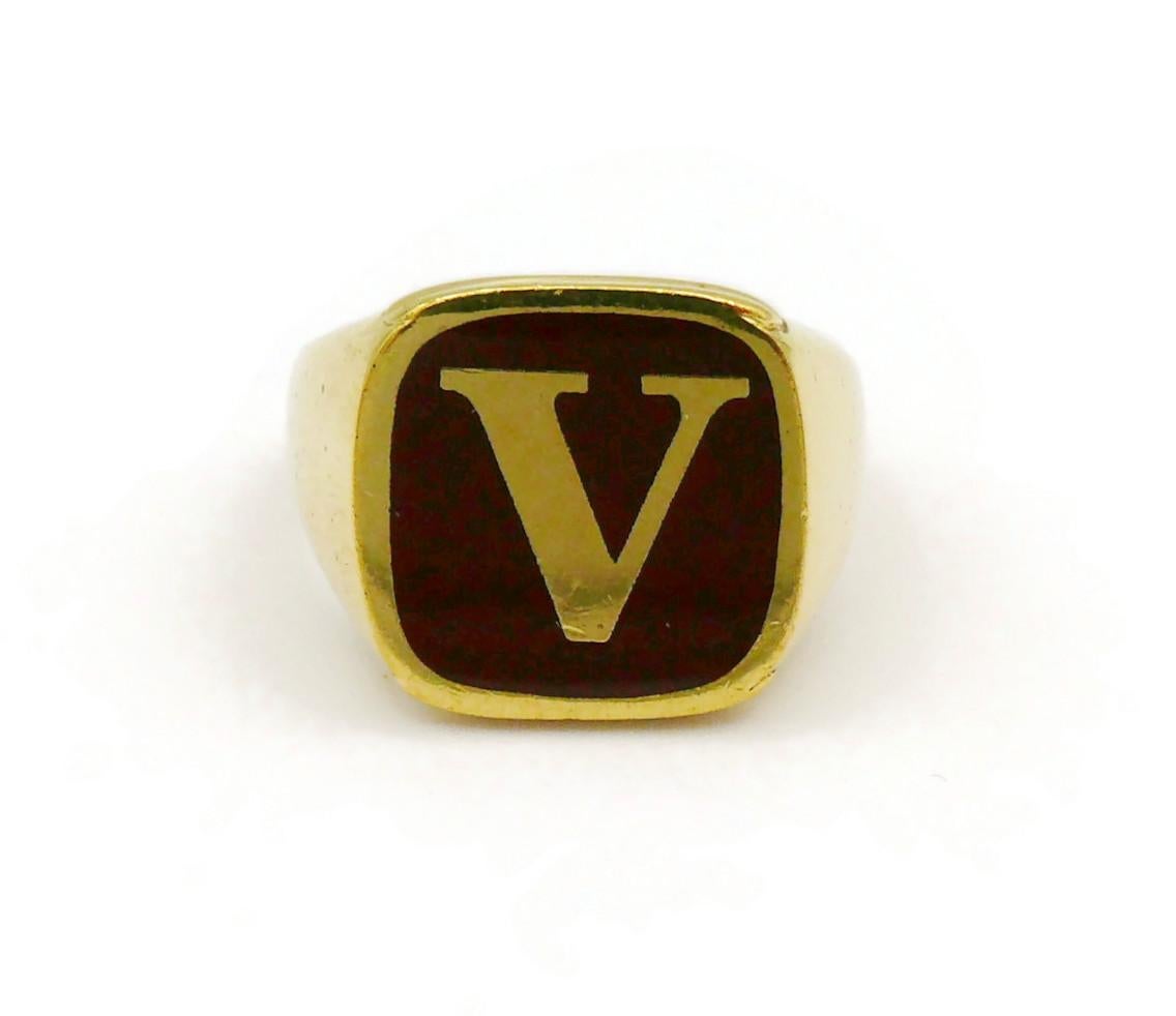DOLCE & GABBANA Set von vier goldfarbenen Ringen L O V E im Angebot 7
