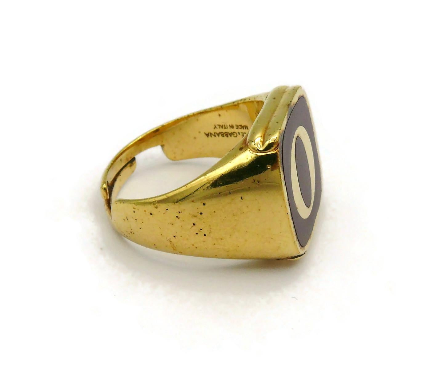 DOLCE & GABBANA Set von vier goldfarbenen Ringen L O V E im Angebot 4