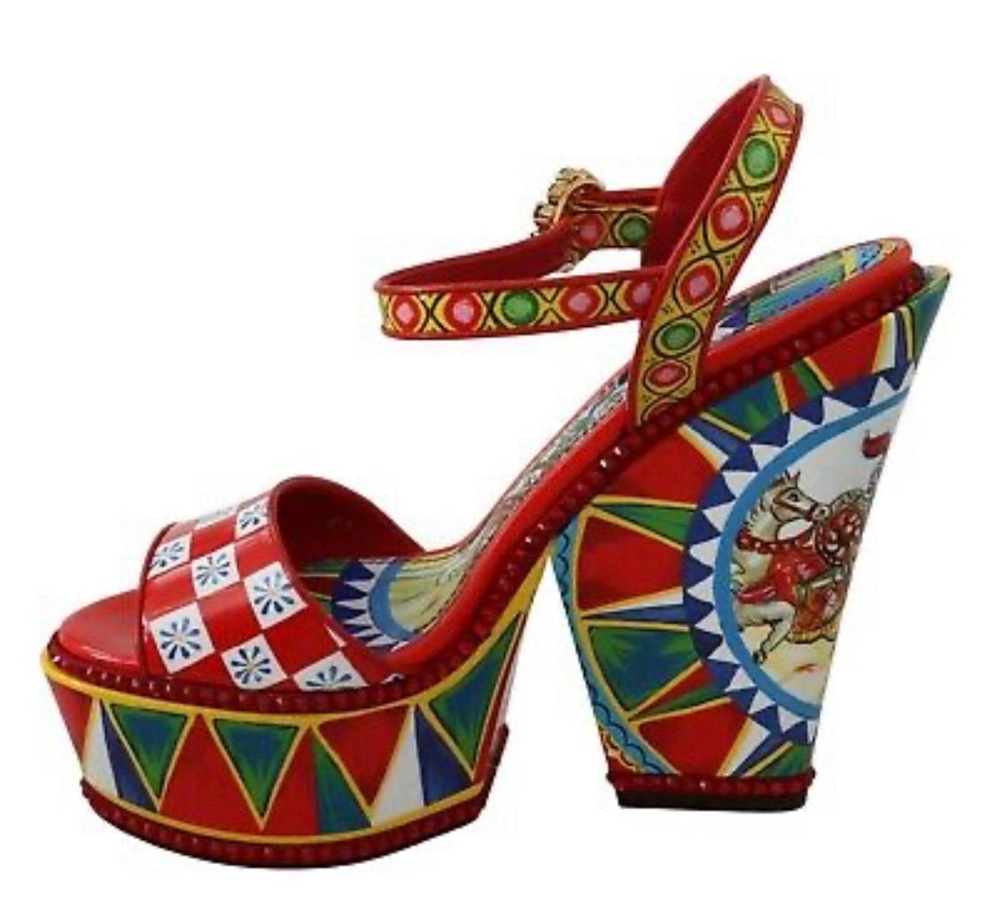 Dolce & Gabbana Shoes

Gorgeous, brand new with tags 100% Authentic Dolce & Gabbanashoes.

Modell: Ankle strap platform sandals
Color: Multicolor carretto print
Material: 3% Cotton, 2% PL, 15% PU, 3% Silk, 7% VI, 70% Leather
Sole: Leather
Crystals: