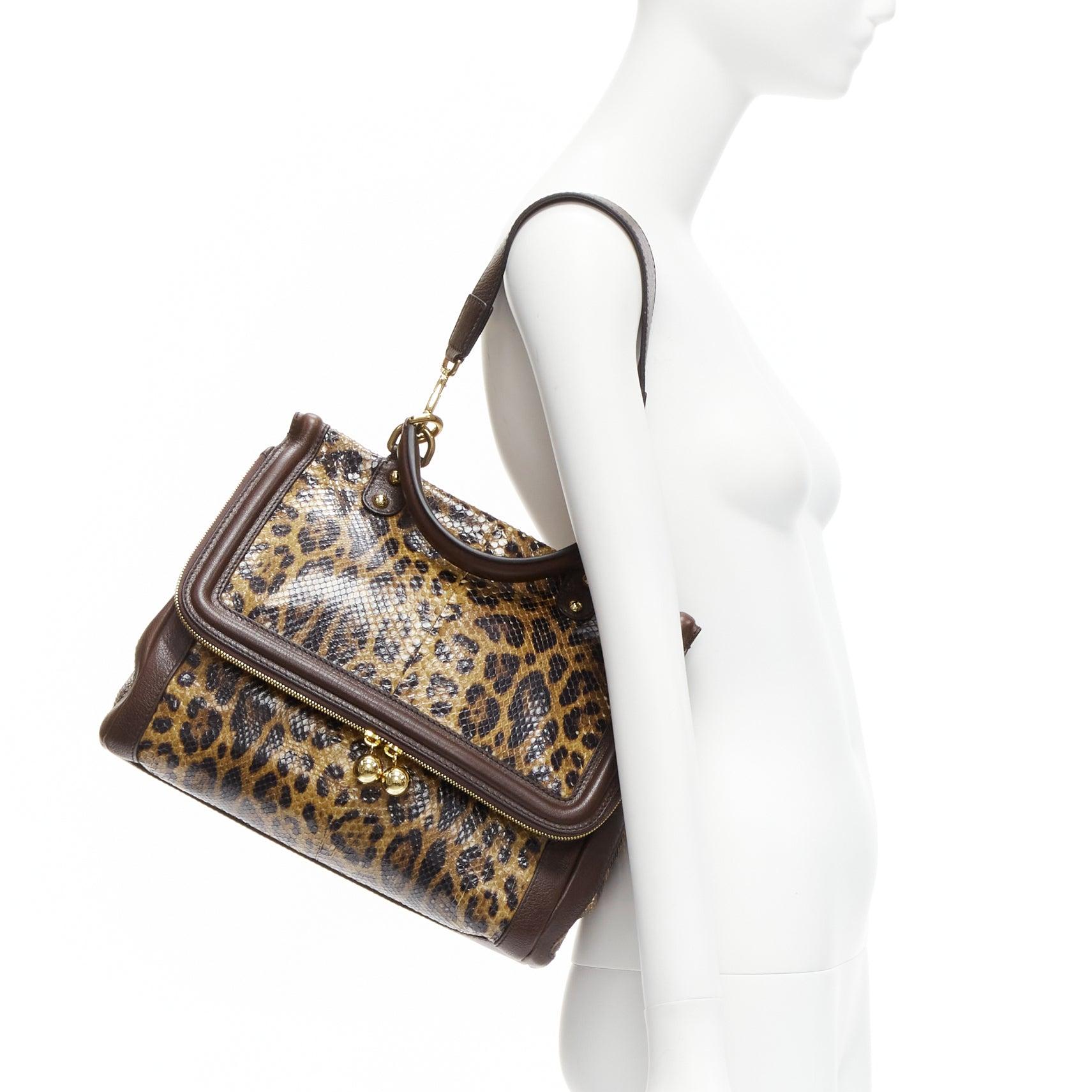 DOLCE GABBANA Sicily brown leopard print scaled leather satchel bag
Reference: TGAS/D00694
Brand: Dolce Gabbana
Designer: Domenico Dolce and Stefano Gabbana
Model: Sicily
Material: Leather
Color: Brown, Multicolour
Pattern: Animal Print
Closure: