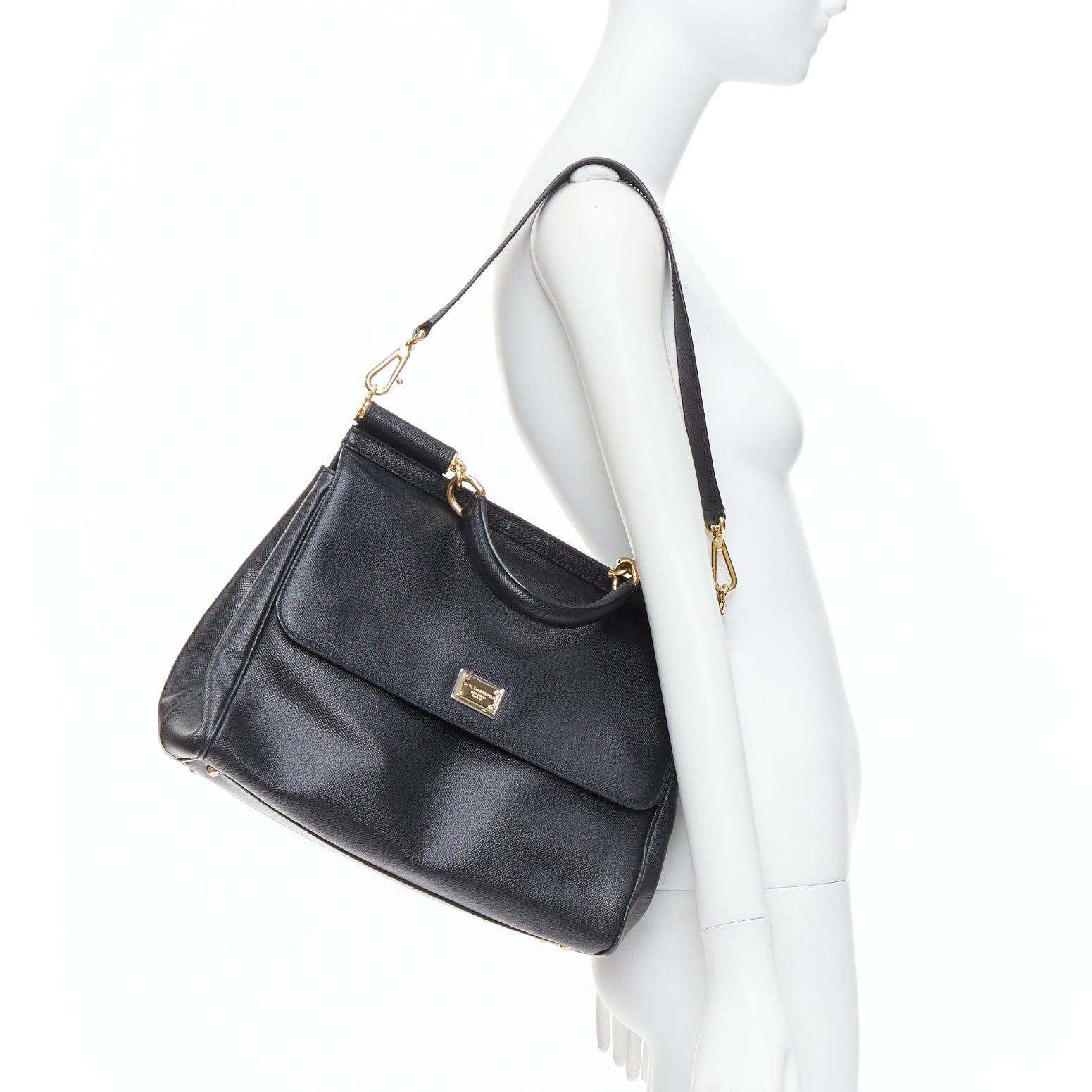 DOLCE GABBANA Sicily classic black grained leather gold hardware bag
Reference: TGAS/E00707
Brand: Dolce Gabbana
Designer: Domenico Dolce and Stefano Gabbana
Model: Sicily
Material: Leather
Color: Black, Gold
Pattern: Solid
Closure: Ankle