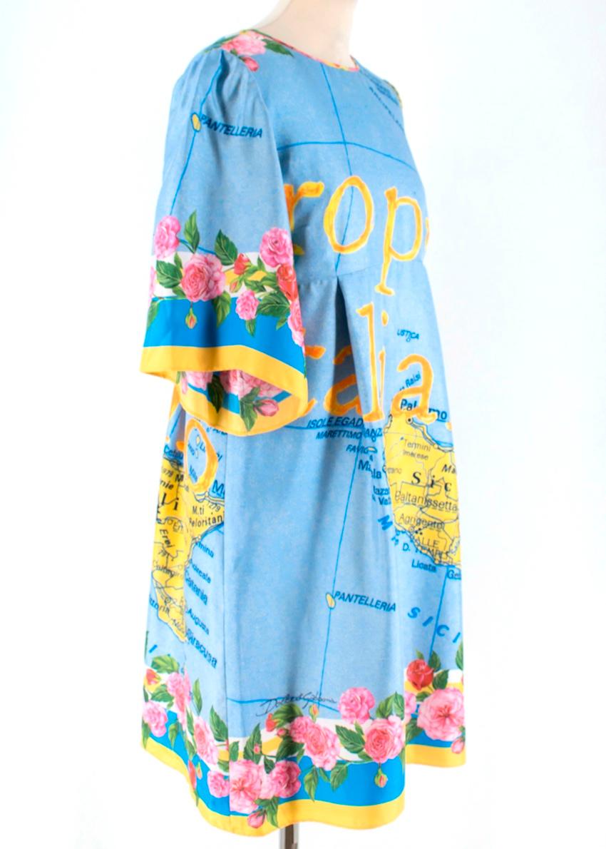 Dolce & Gabbana dress made from silk and printed with the Sicily Map. 

- Crew neck 
- Knee length
- Short bell sleeve
- Zip closure
- 100% Silk
- Made in Italy


Please note, these items are pre-owned and may show signs of being stored even when