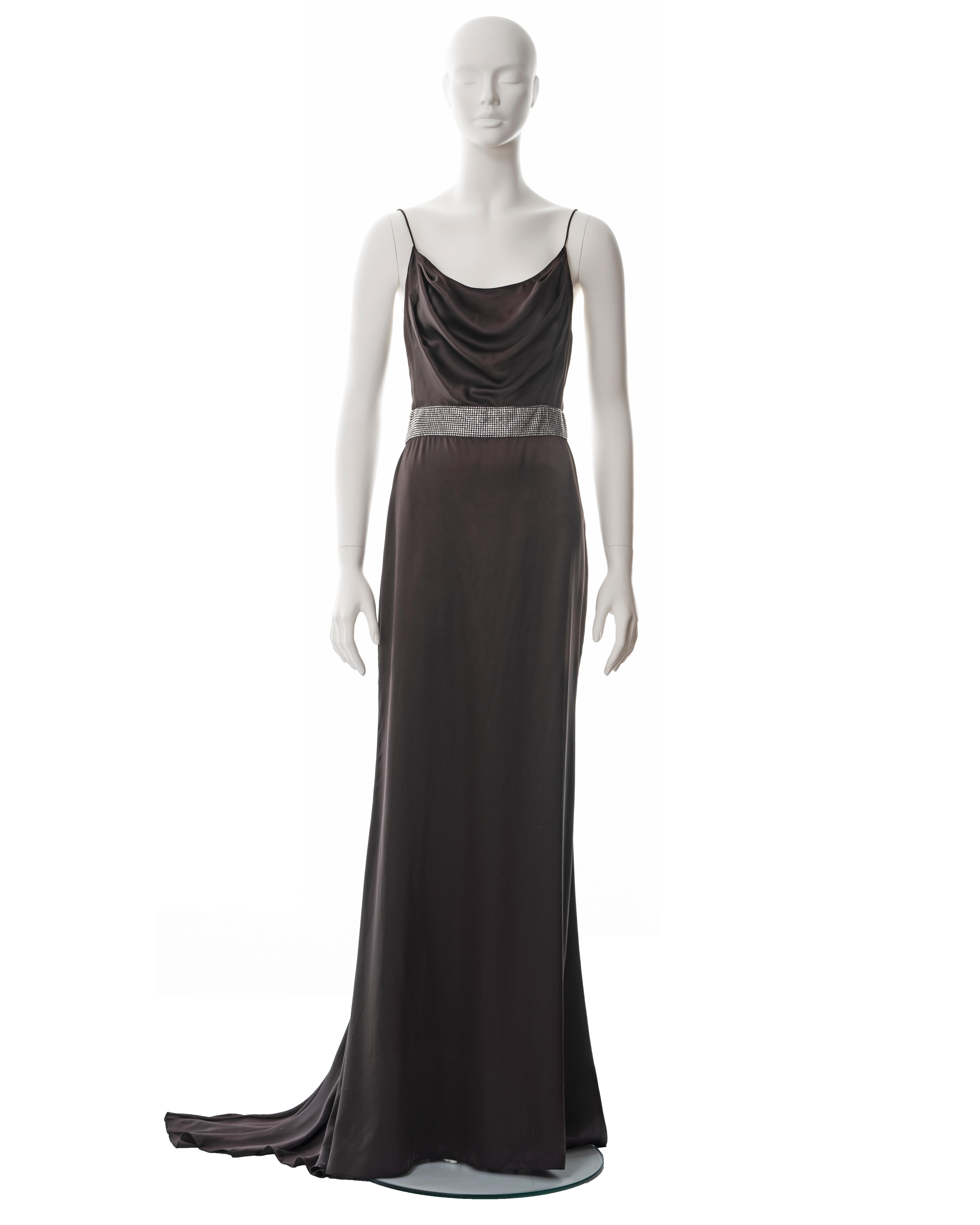 ▪ Dolce & Gabbana silk brown evening dress
▪ Sold by One of a Kind Archive
▪ Fall-Winter 2005
▪ Cowl neck
▪ Crystal waistband 
▪ Back zip fastening 
▪ Floor-length skirt with train 
▪ IT 40 - FR 36 - UK 8
▪ Made in Italy

All photographs in this