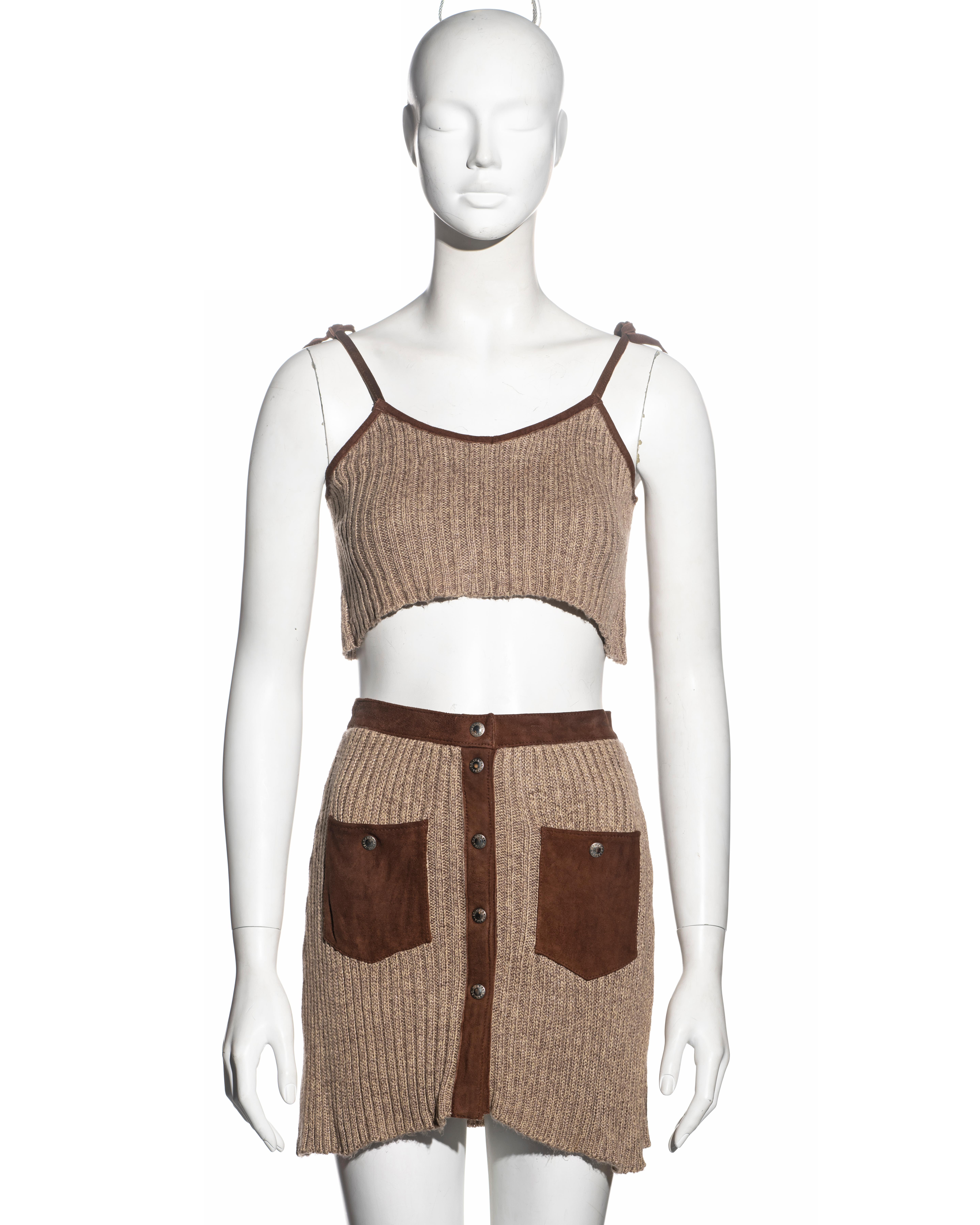 ▪ Dolce & Gabbana crop top and skirt set
▪ Silk-cotton ribbed knit 
▪ Brown suede trim
▪ Silver press stud buttons 
▪ 2 front patch pockets
▪ IT 42 - FR 38 - US 6
▪ Spring-Summer 1994
▪ 85% Silk, 15% Cotton
▪ Made in Italy
