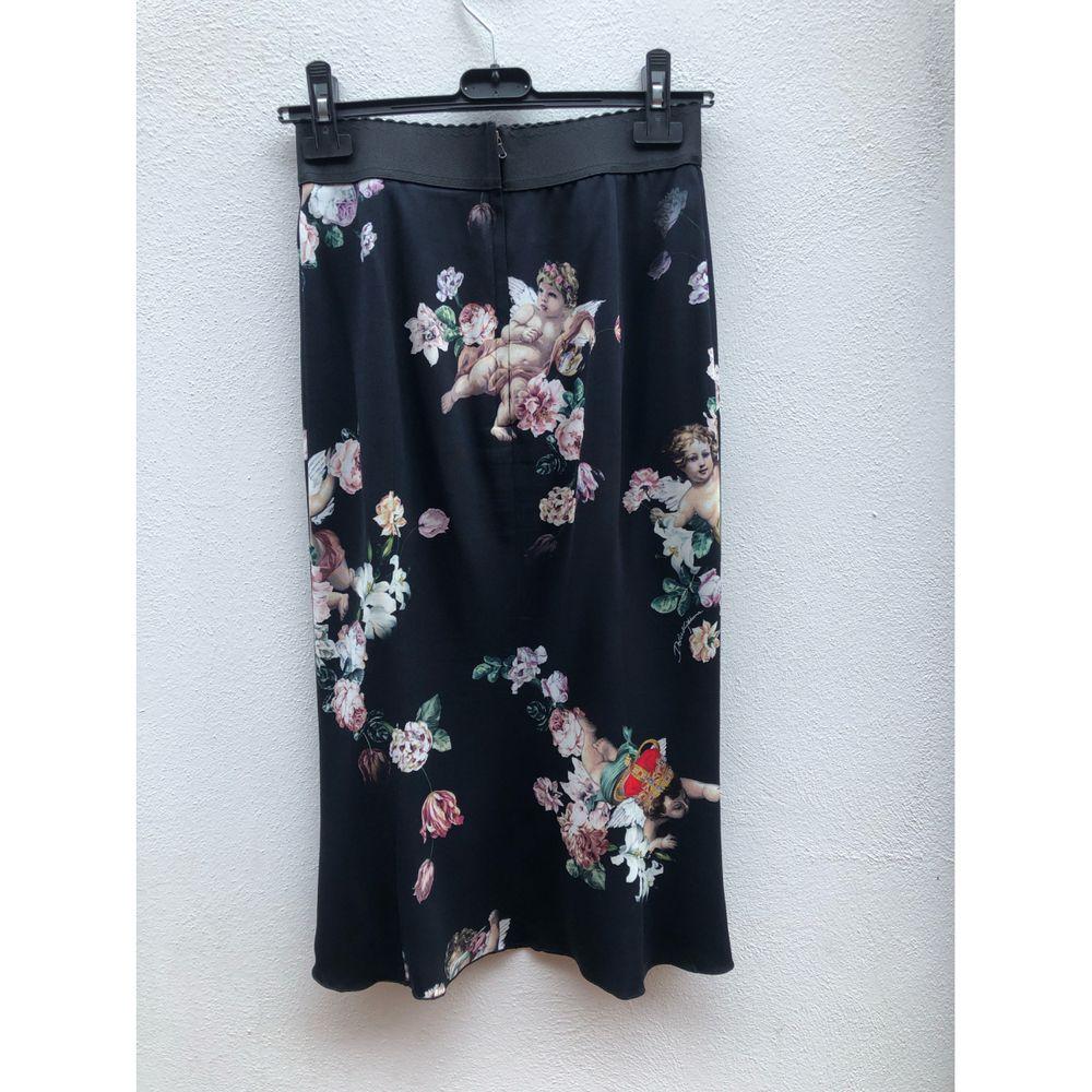 Dolce & Gabbana Silk Mid-Length Skirt in Black In Good Condition In Carnate, IT
