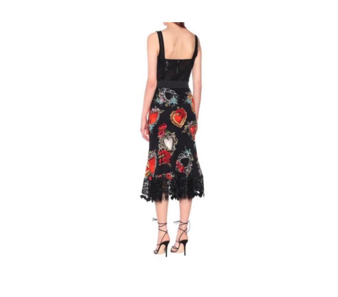 Black Dolce & Gabbana Silk midi skirt
With heart and Rose print in black