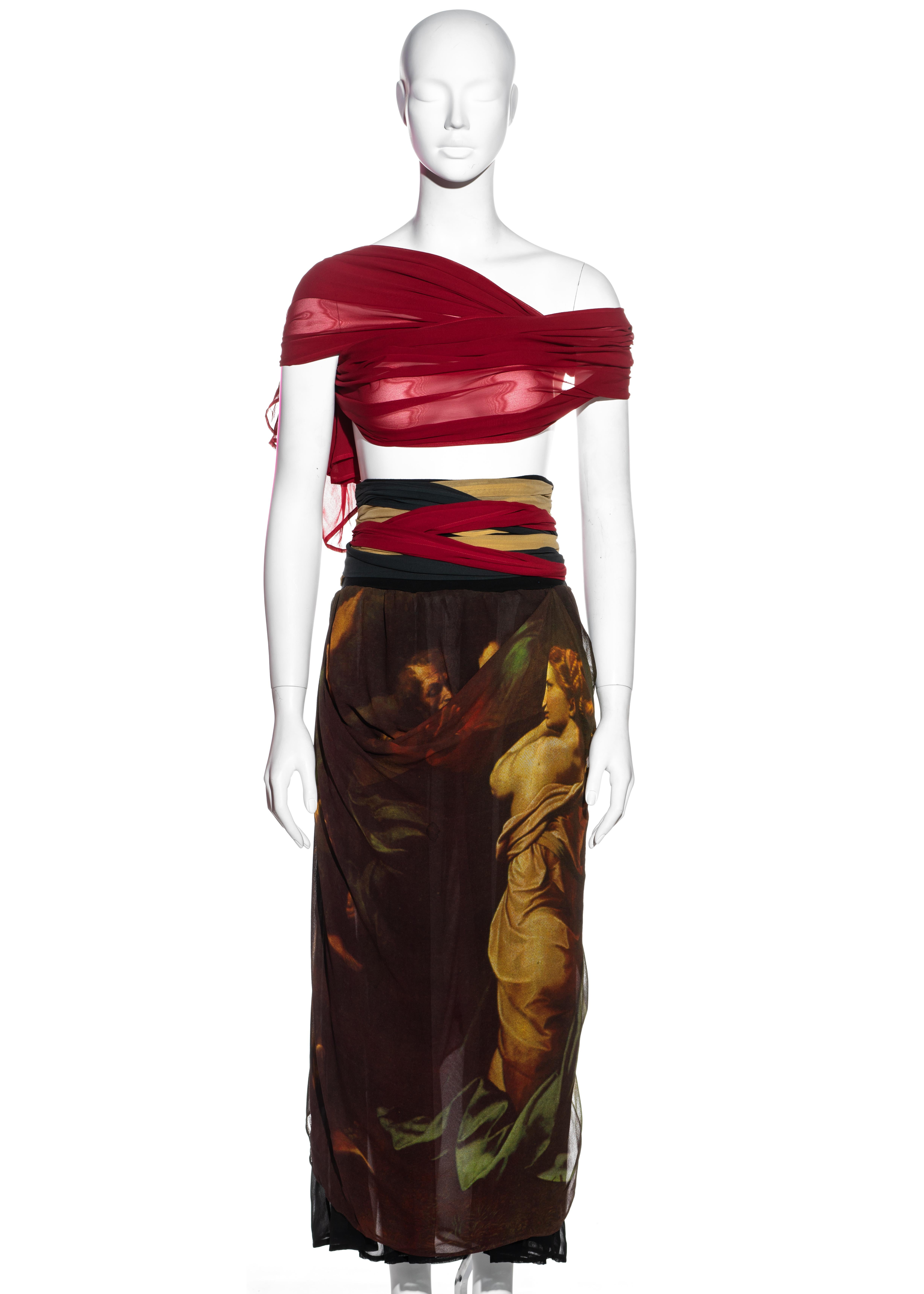 Gonna a ruota Dolce & Gabbana 
Stampa: Trasfigurazione di Raffaello (1516-1520)
Sei lacci in vita
Fascia in vita in jersey nero
Venduto con la sciarpa rossa abbinata, come top. 
IT 44 - FR 40 - UK 12 - US 8
Primavera-Estate 1990