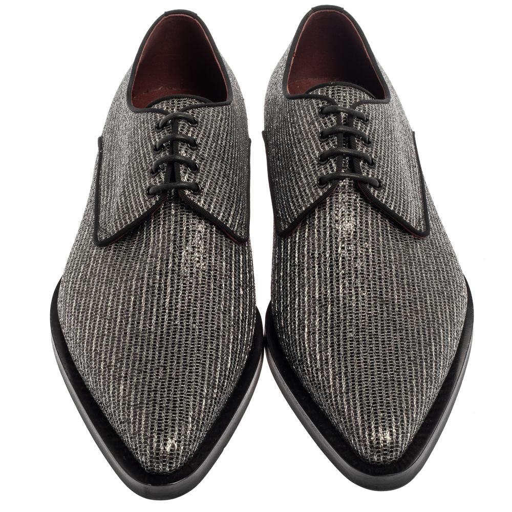 Bringing unceasing shine and comfort to your feet, these Dolce & Gabbana derby shoes are truly special. Made using glitter fabric, they feature pointed toes, lace-up closure, and low heels with durable soles. Even with a simple outfit, the shoes are