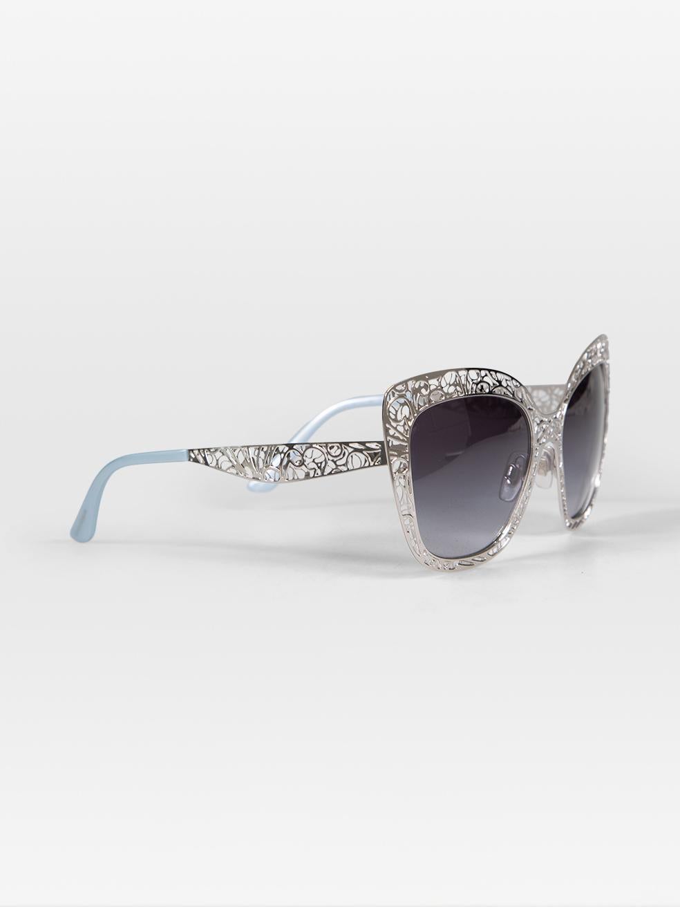 CONDITION is Very Good. Hardly any visible wear to sunglasses is evident on this used Dolce & Gabbana designer resale item. Comes with original case.
 
 Details
 
 
 Silver
 
 Metal
 
 Sunglasses
 
 Butterfly frame
 
 Metal cut out detail
 
 Grey