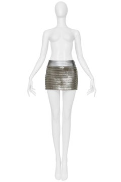 Gonna corta in pelle argentata Dolce & Gabbana con dischi metallici, 2003