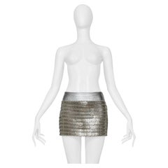 Gonna corta in pelle argentata Dolce & Gabbana con dischi metallici, 2003