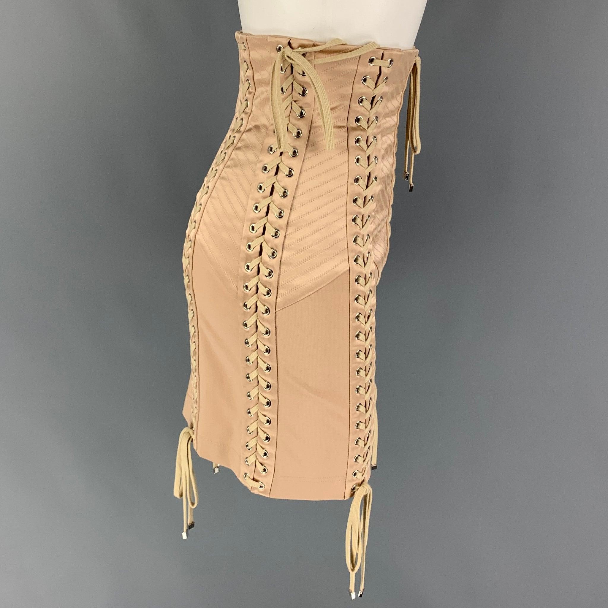 DOLCE & GABBANA skirt comes in a nude acetate blend featuring a corset inspired design, eyelets, lace details, and a back zip up closure. Made in Italy. Excellent
Pre-Owned Condition. 

Marked:   38 

Measurements: 
  Waist: 24 inches  Hip: 30