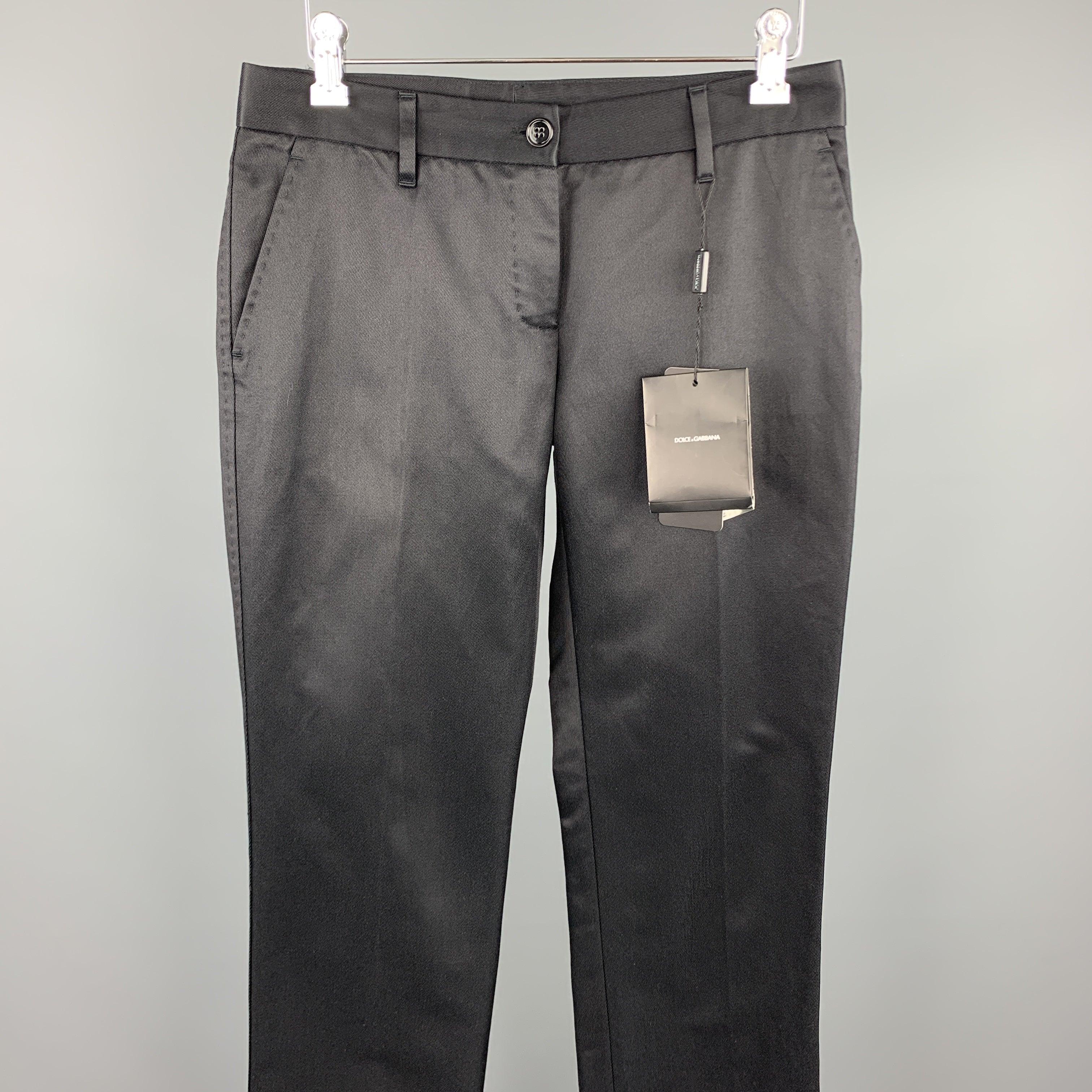 DOLCE & GABBANA dress pants black cotton / silk featuring a flat front and a zip fly closure. Made in Italy.New With Tags. 

Marked:   IT 38 

Measurements: 
  Waist: 29 inches 
Rise: 6.5 inches 
Inseam: 35 inches 
  
  
 
Reference:
