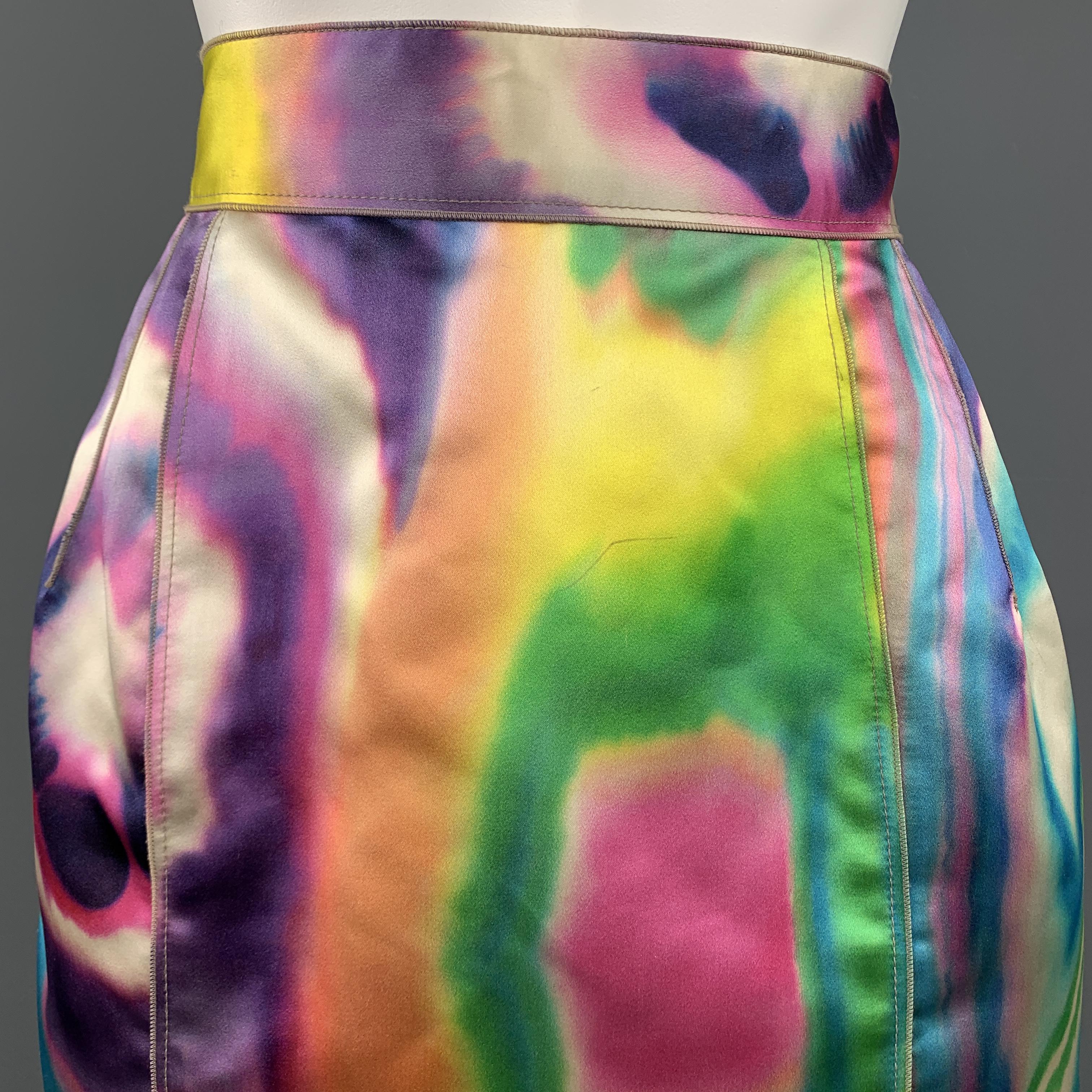 DOLCE & GABBANA mini skirt comes in a multi color water color print silk satin with a high rise and exposed back zip. Marks on front. As-is. Made in Italy.

New with Defect.
Marked: IT 38
Original Retail Price: $876.00

Measurements:

Waist: 25